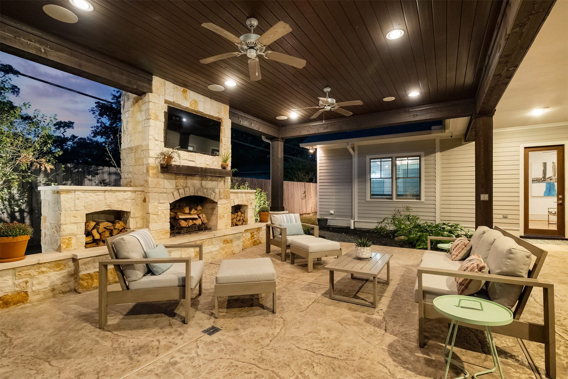 Enjoy cozy fires in the outdoor wood burning fireplace while relaxing or entertaining