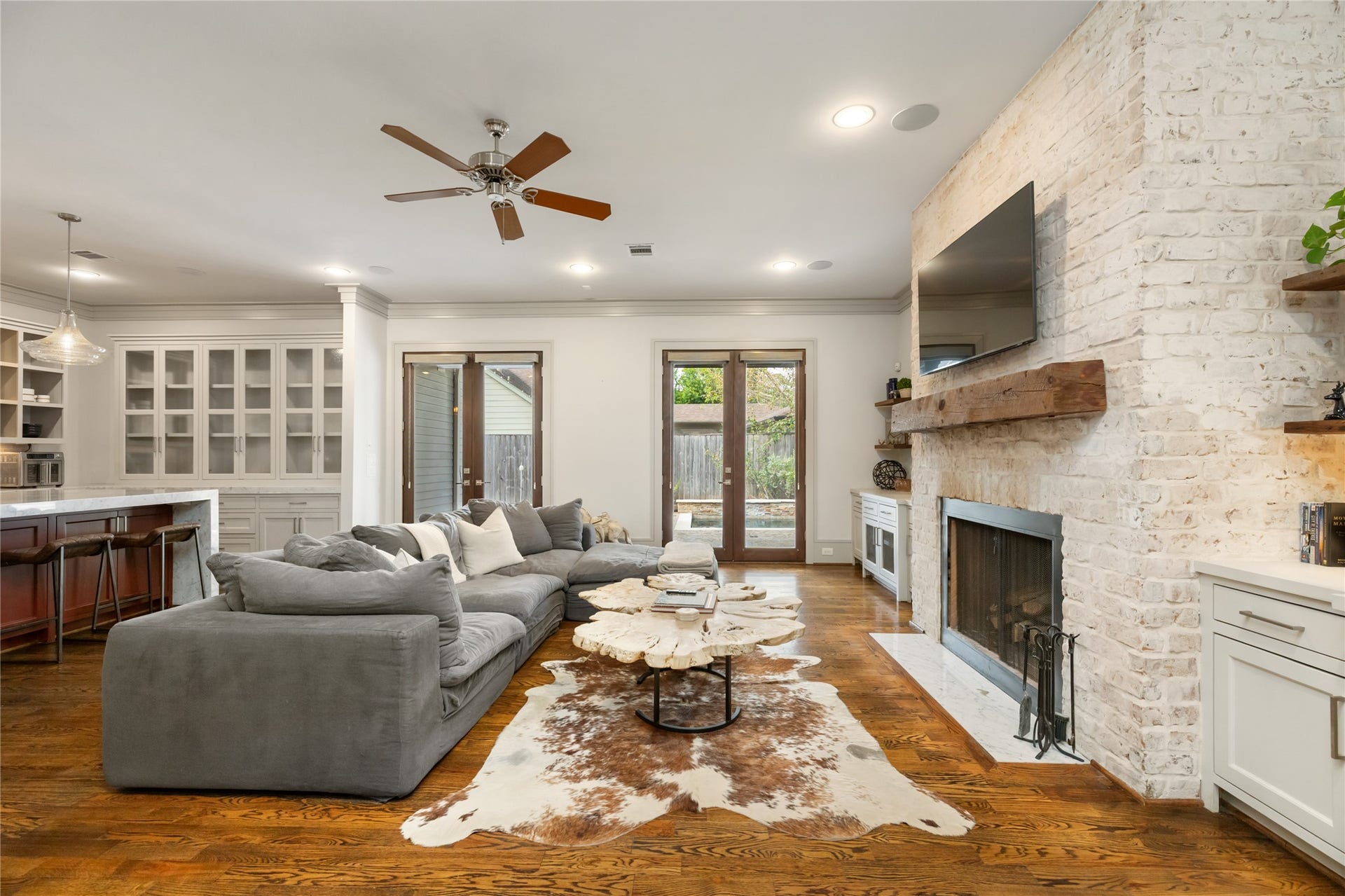 Relax by the beautiful stone wood burning fire place with gas igniter