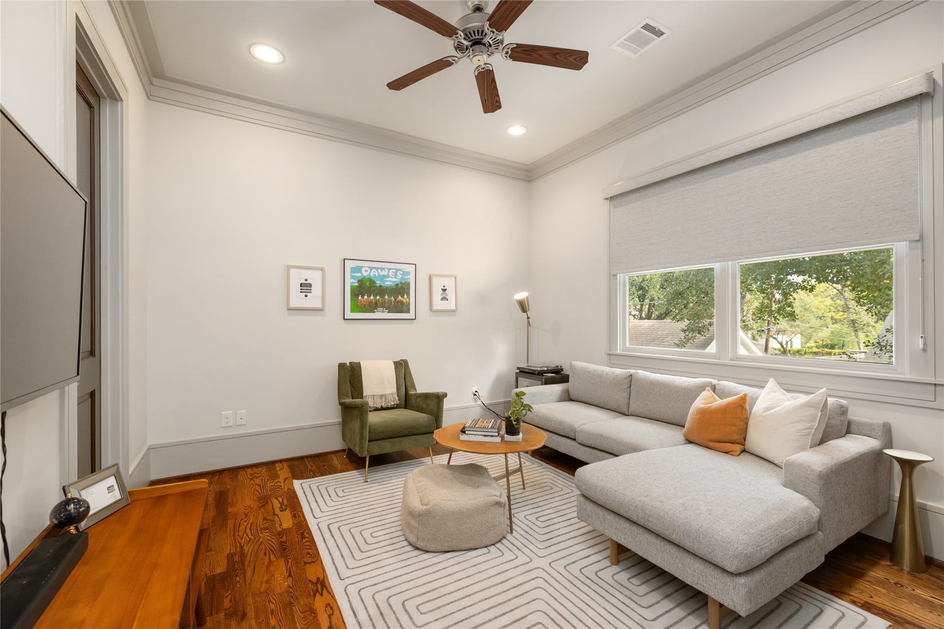 The fourth bedroom is currently used as a cozy tv room