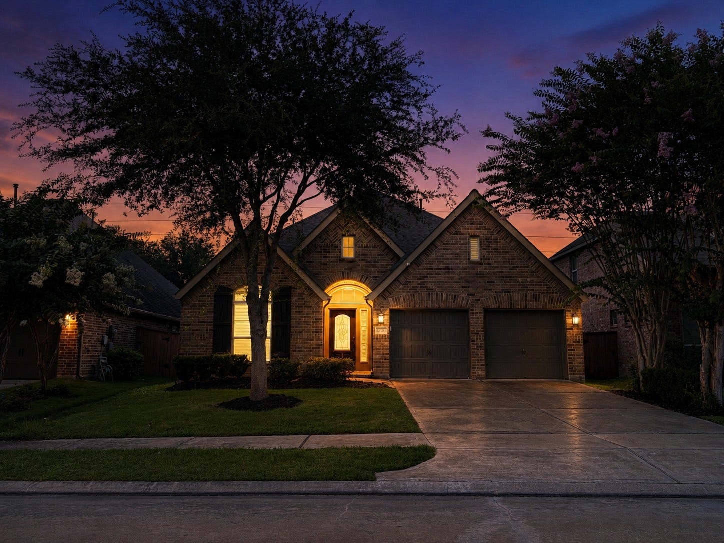 17514 Woodfalls Lane, Richmond, TX 77407 Twilight view of the front of the home