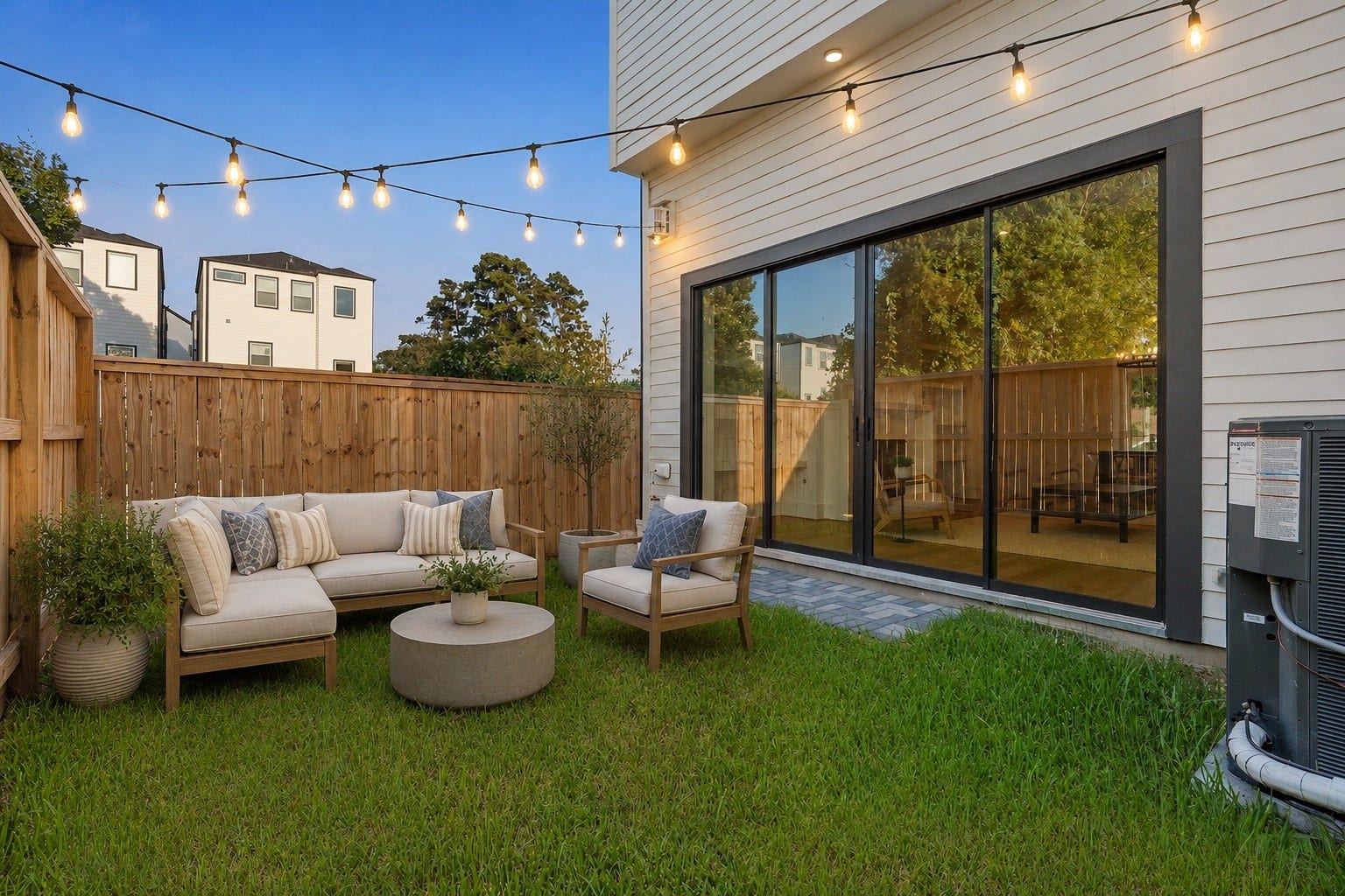 Outdoor Oasis - Accessed through large sliding glass doors from the living room. This space is
ideal for lounging, grilling, outdoor dining and relaxing. Your secluded sanctuary for play with
family and pets.