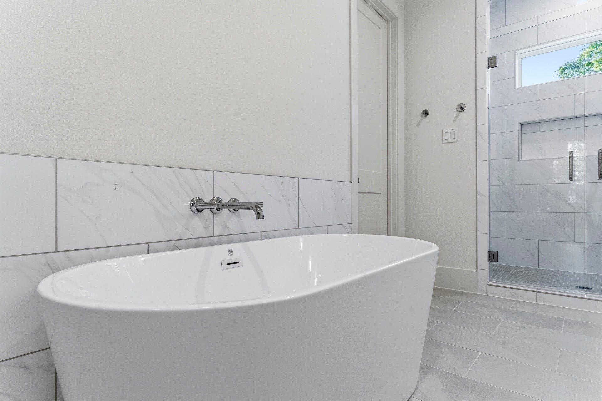 Magazine Worthy  No detail left behind, timeless design, upscale features, this exquisite
owner's bath is Joy to behold with freestanding soaking & tub frameless shower attached to
his/hers closet making your morning routine a breeze.