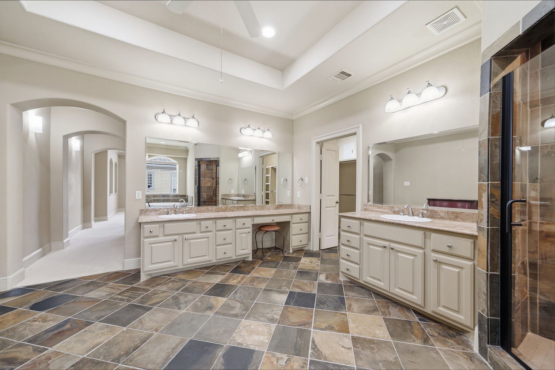 15 Laurelwood Drive, Houston, TX 77058 The bath opens to a very spacious closet that spans the length of the area...