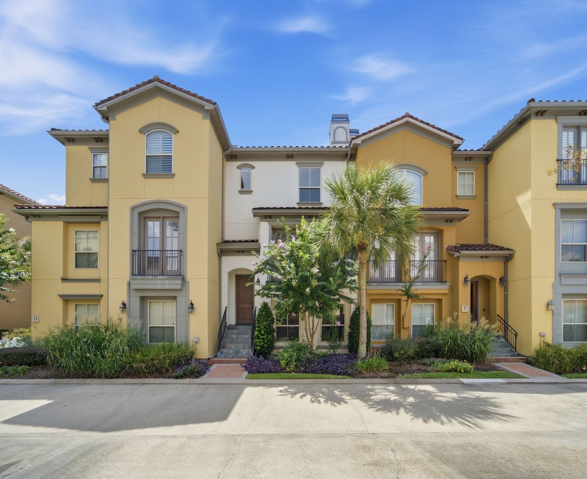 15 Laurelwood Drive, Houston, TX 77058 Your chic townhouse is surrounded by blooming, tropical landscaping that is taken care of for you!