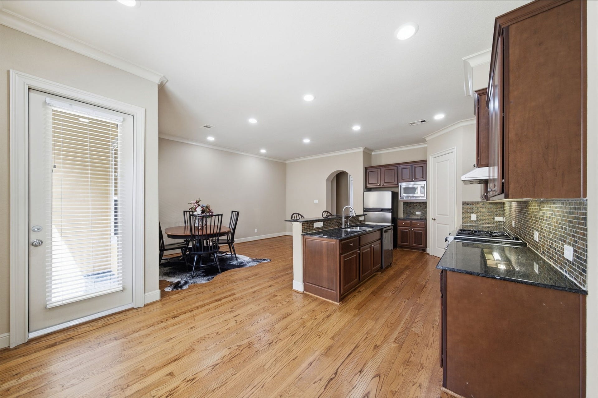 15 Laurelwood Drive, Houston, TX 77058 Multiple living areas offer flexible space in the kitchen...