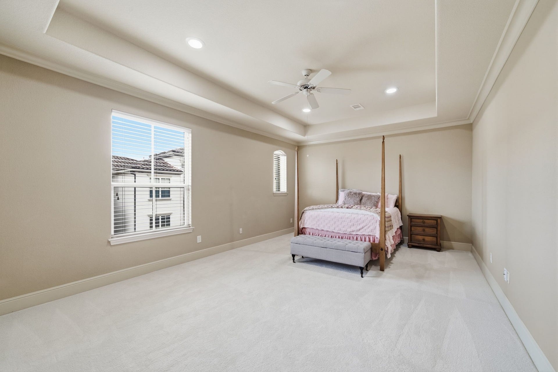 15 Laurelwood Drive, Houston, TX 77058 Freshly replaced carpet is plush and comfortable in the primary bedroom.