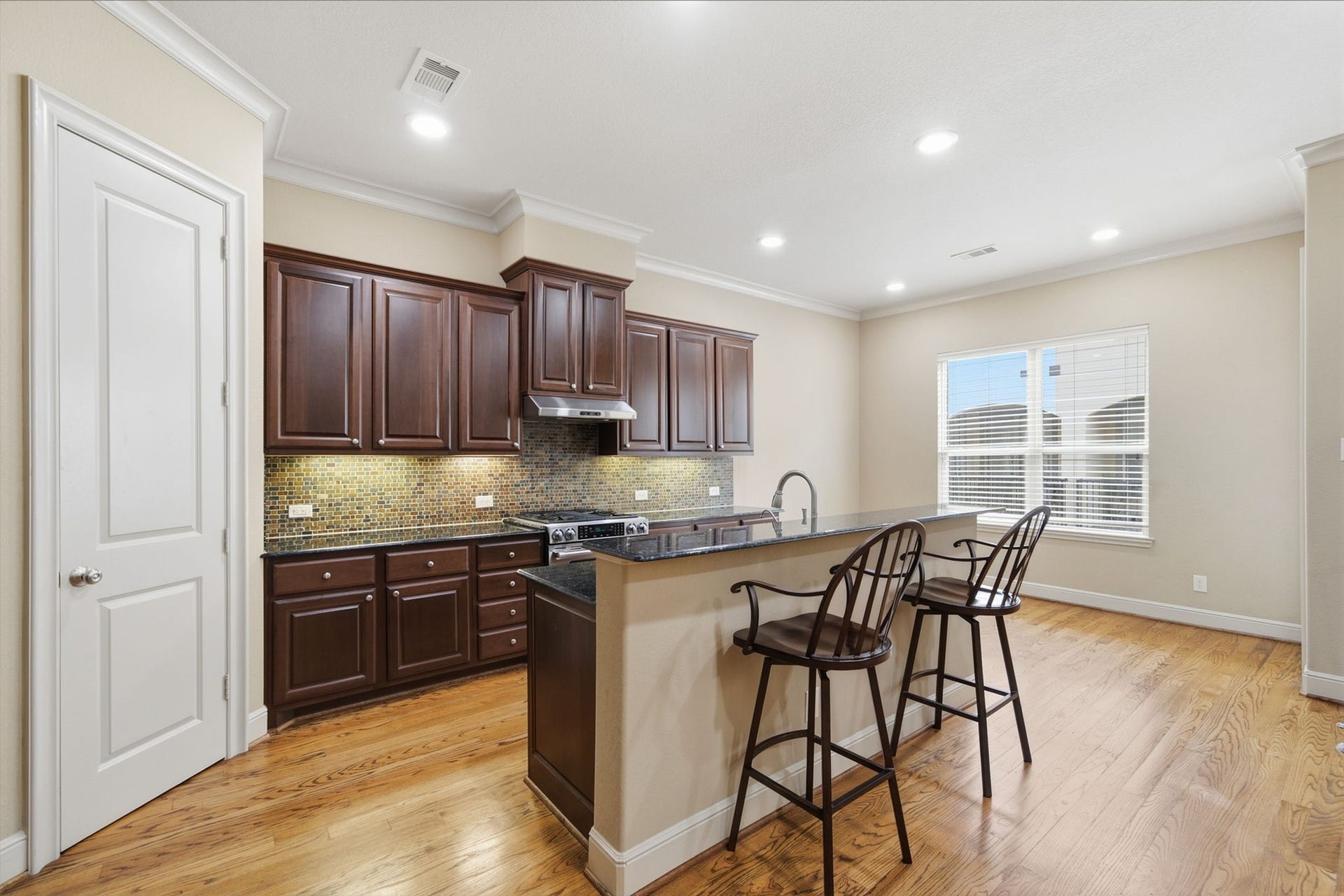 15 Laurelwood Drive, Houston, TX 77058 The breakfast room opens to a rear balcony...