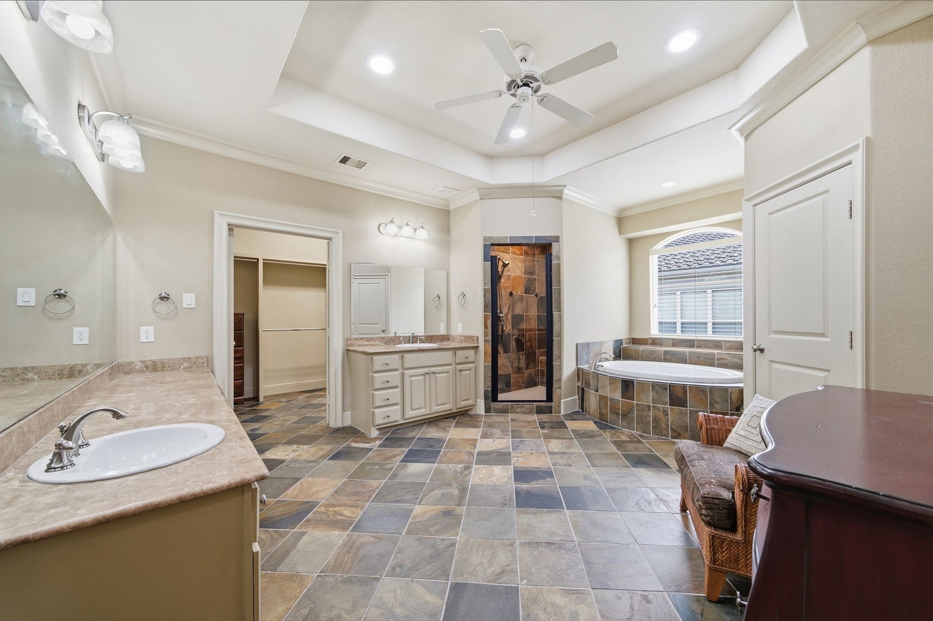 15 Laurelwood Drive, Houston, TX 77058 Slate tile offers an inviting earthy vibe...