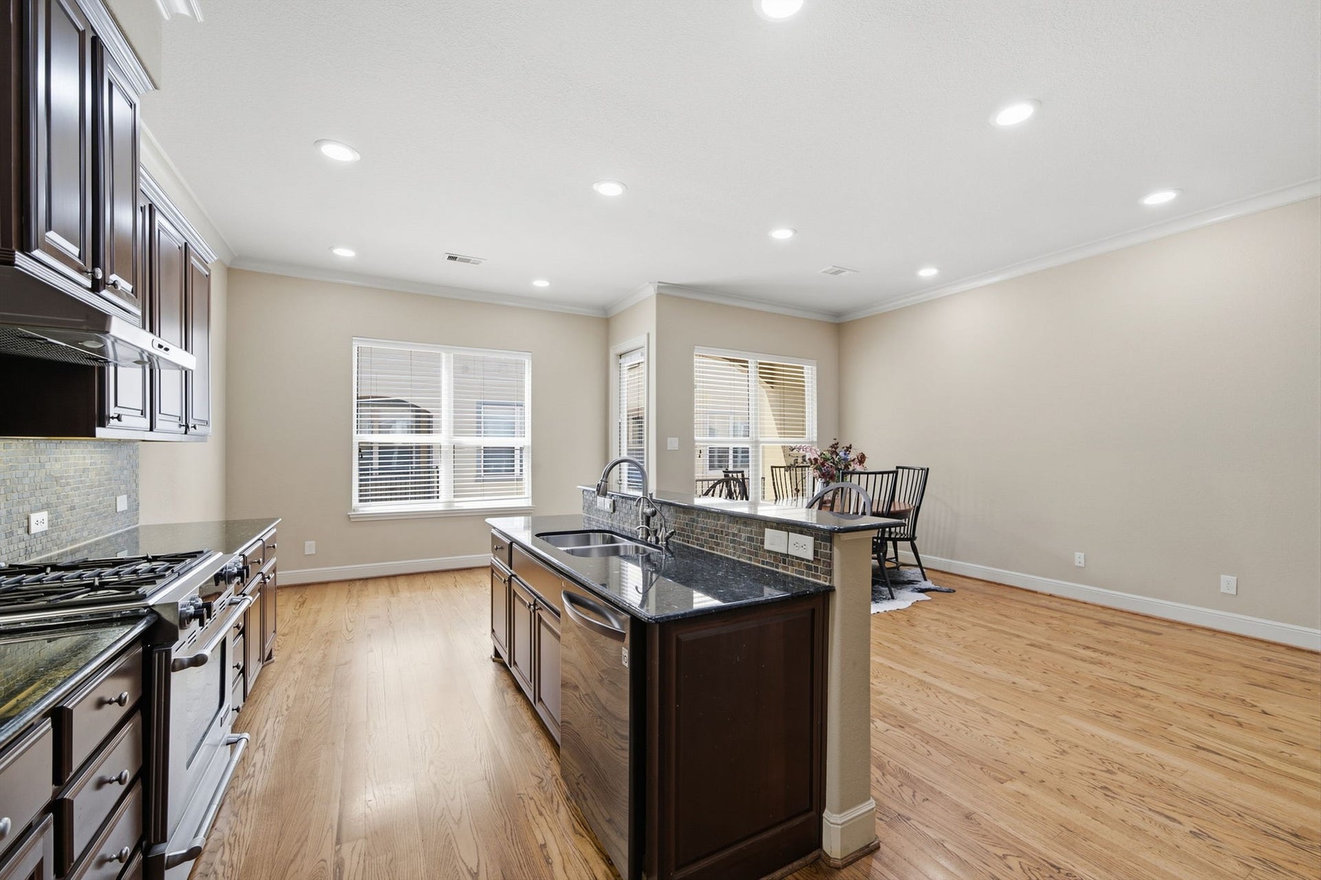 15 Laurelwood Drive, Houston, TX 77058 The kitchen opens to multiple areas that can become spaces for gathering and dining...