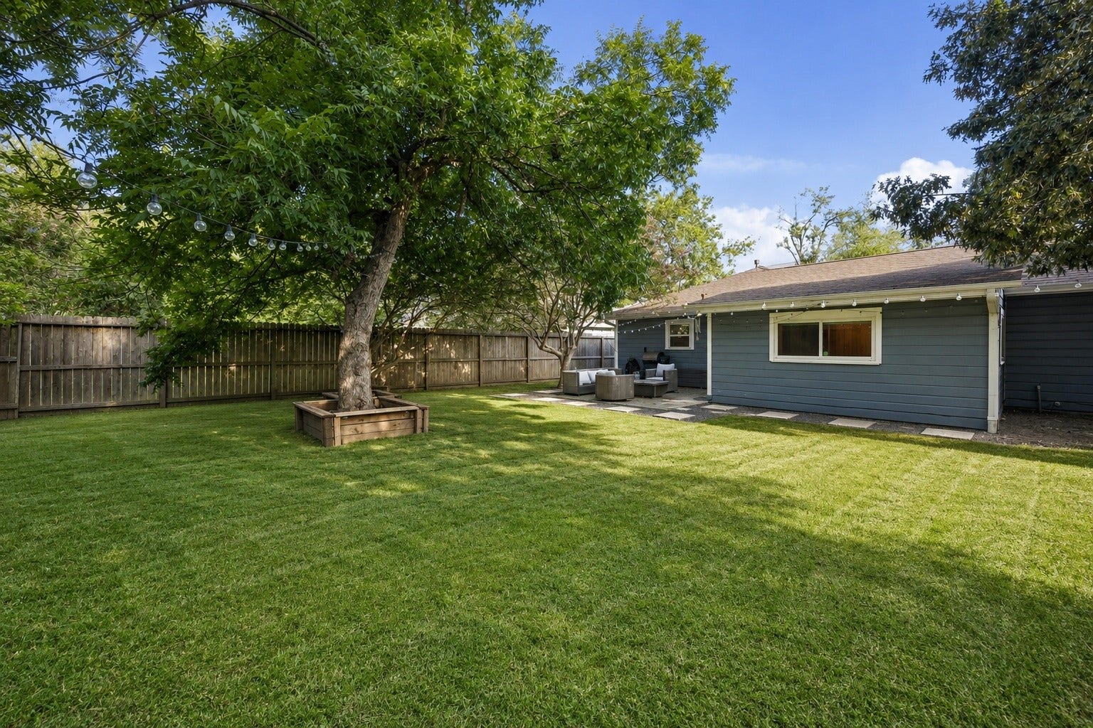2214 Saxon Drive, Houston, TX 77018 An expansive backyard offers endless possibilities, from hosting gatherings beneath the mature shade trees to creating your own garden or play area. Freshly manicured grass and multiple entertaining spaces make this outdoor setting just as enjoyable as the home itself.