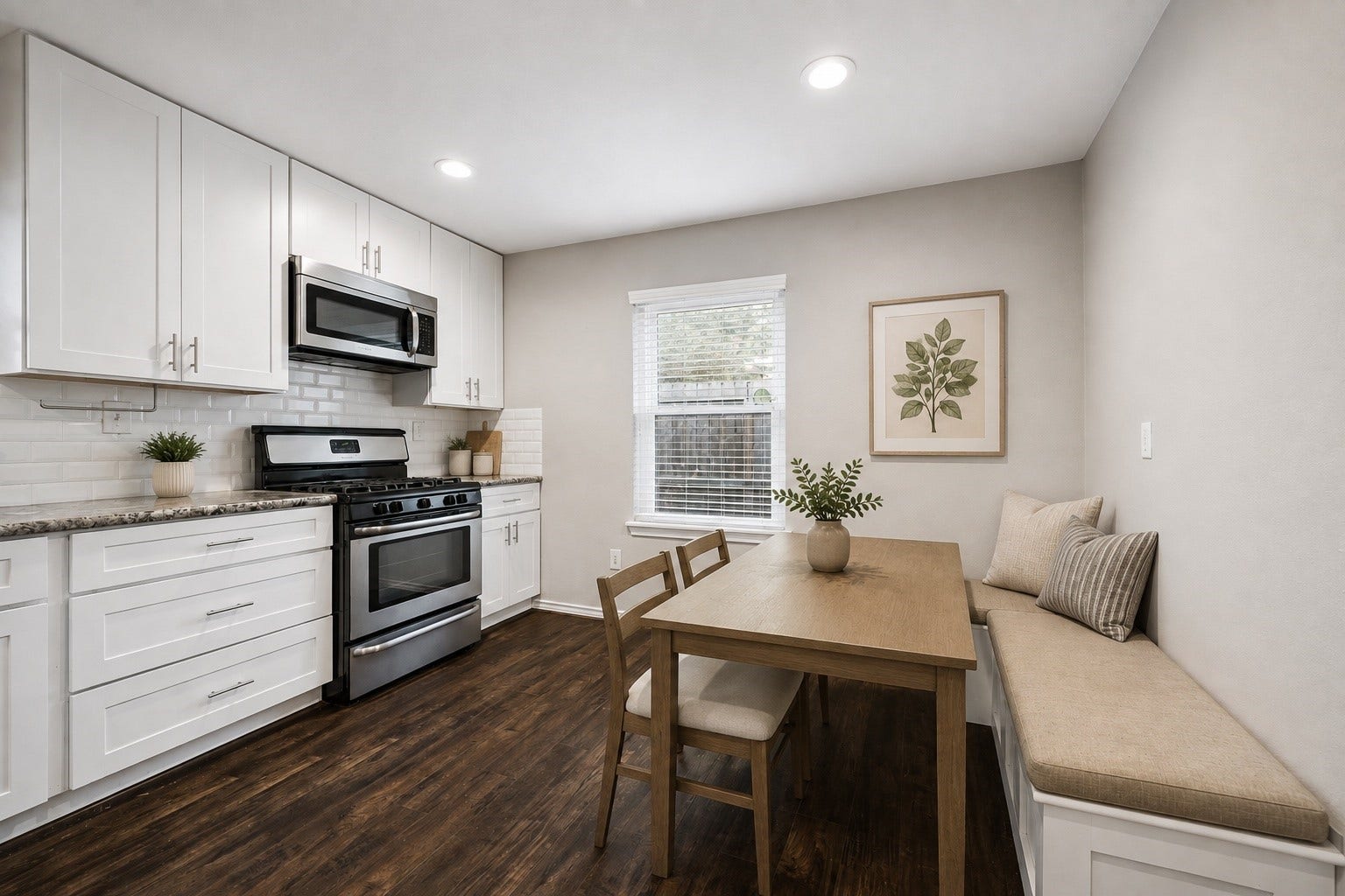 2214 Saxon Drive, Houston, TX 77018 Built in bench seating creates a cozy breakfast nook that makes the most of the kitchen layout. A custom dining table fits perfectly for morning coffee, casual meals, or homework while staying connected to the heart of the home. **Virtually staged**