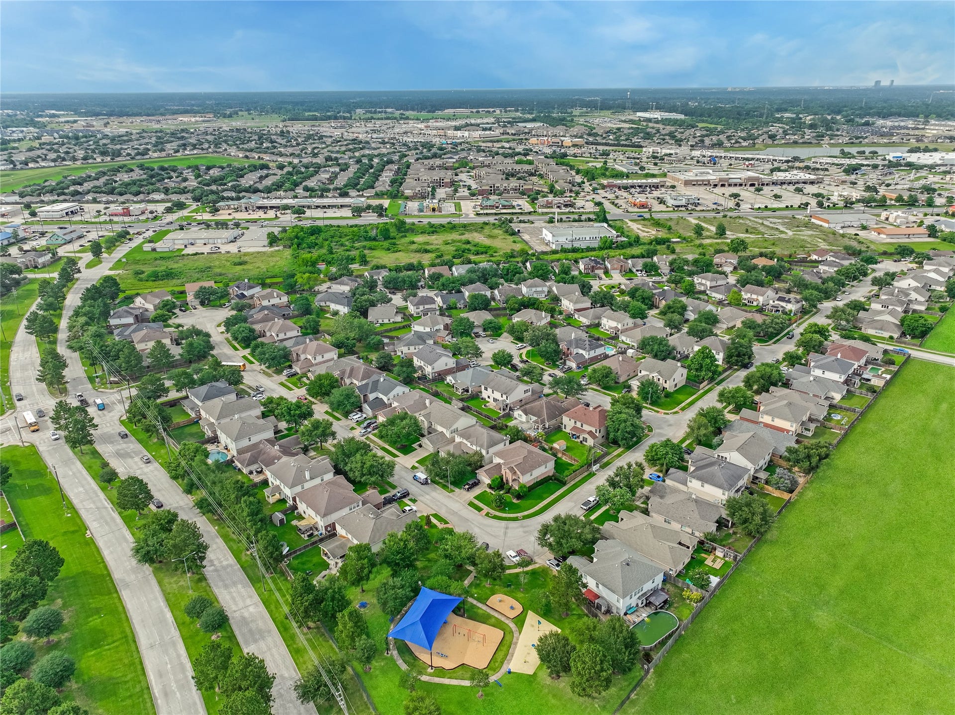20911 Harvest Terrace Lane, Spring, TX 77379 High-altitude aerial view of the residential neighborhood, surrounding homes, and streets.