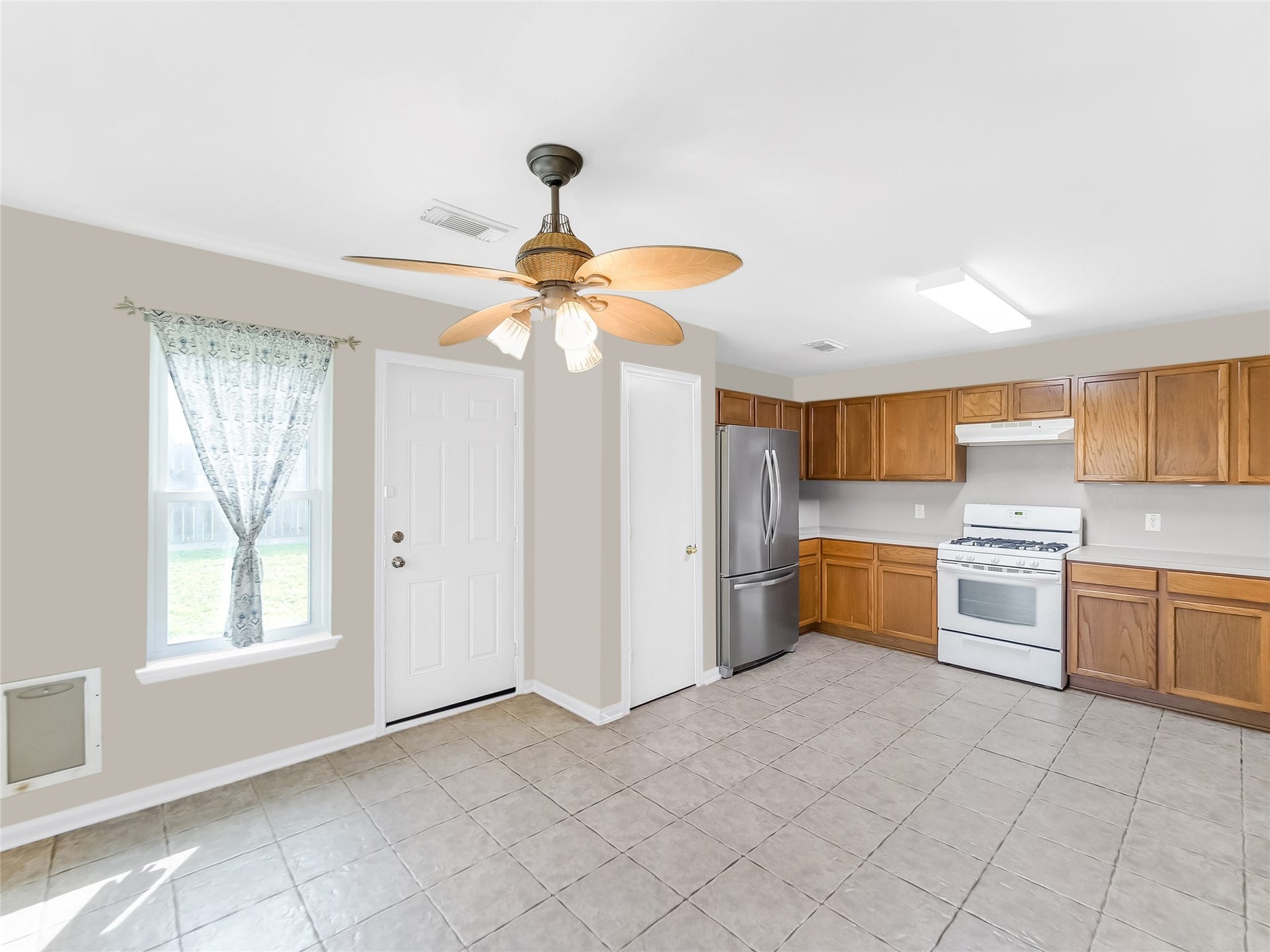 20911 Harvest Terrace Lane, Spring, TX 77379 Kitchen with appliances, and natural light.