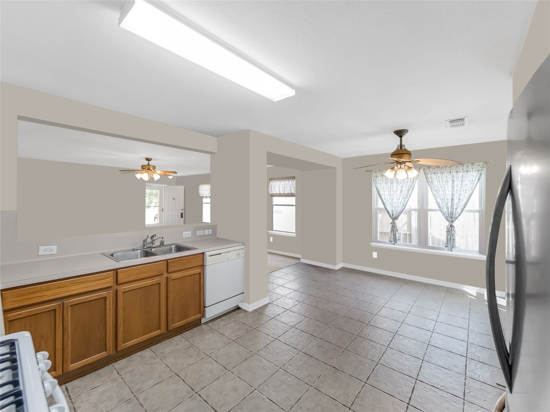 20911 Harvest Terrace Lane, Spring, TX 77379 Spacious kitchen with ample cabinet storage.