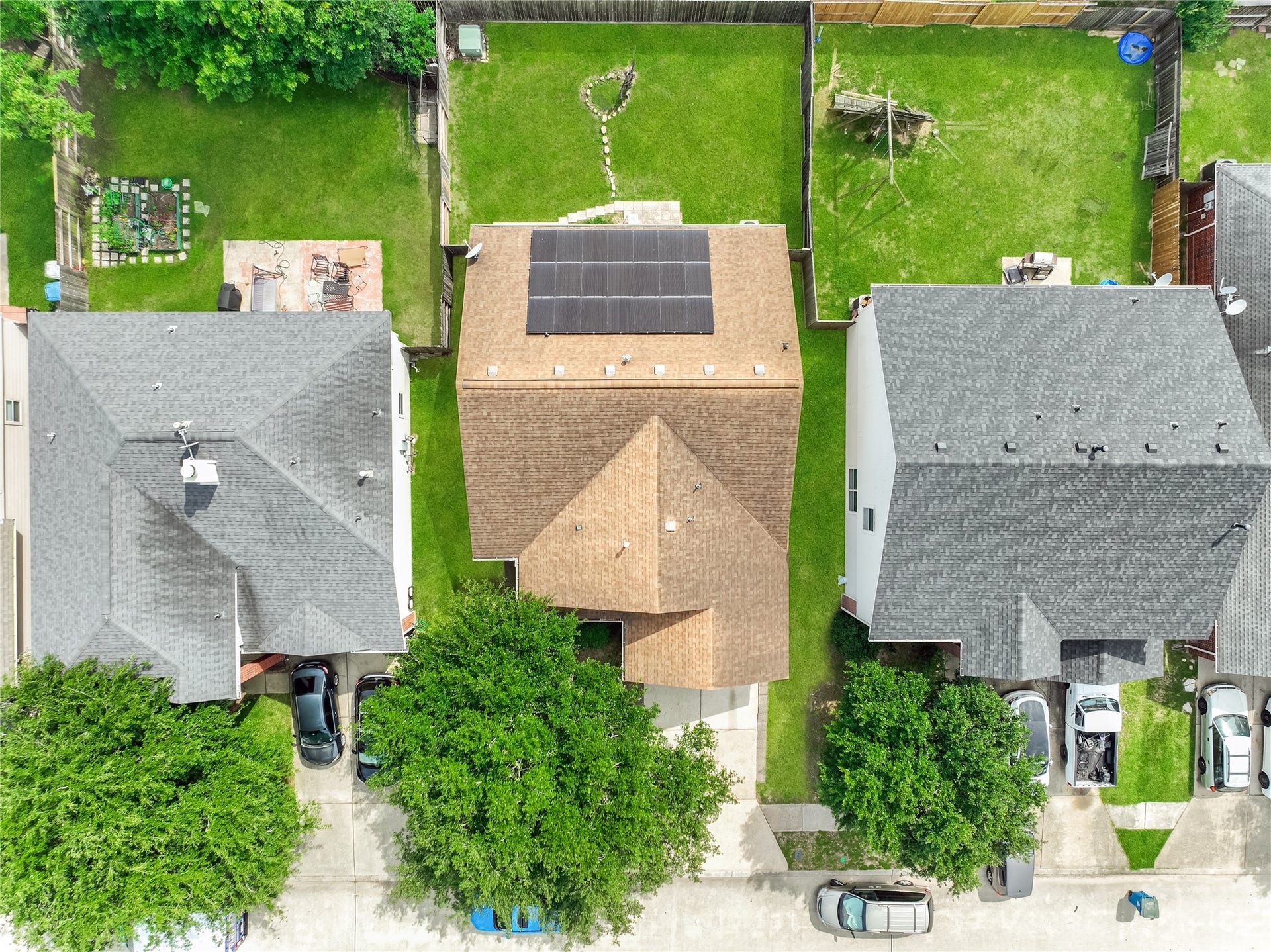 20911 Harvest Terrace Lane, Spring, TX 77379 Overhead aerial view of the property with the house, backyard, and neighboring residential lots.