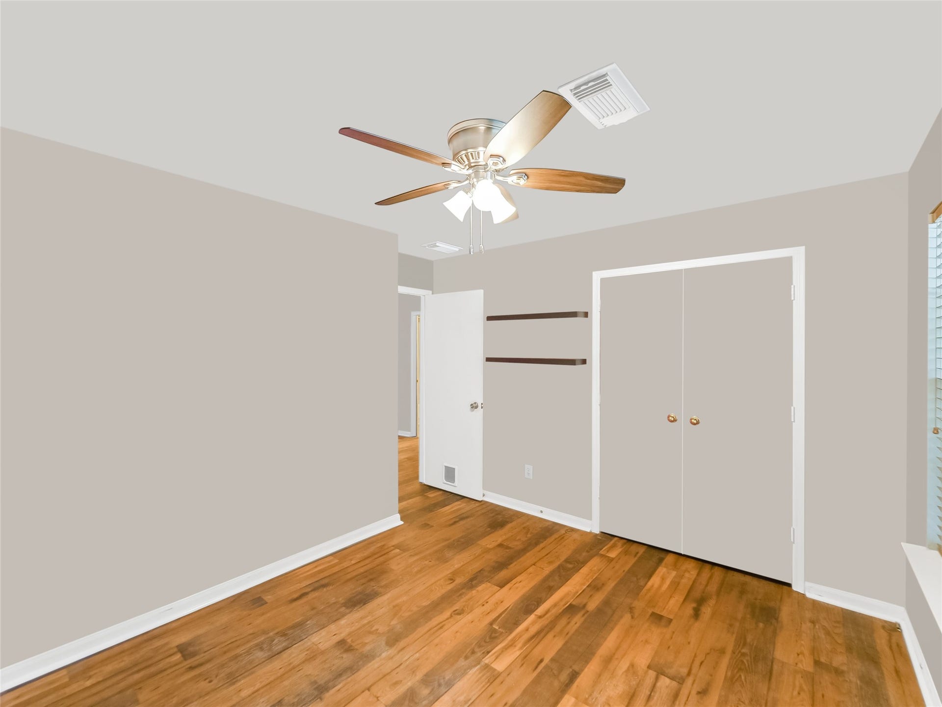 20911 Harvest Terrace Lane, Spring, TX 77379 Bedroom with a ceiling fan, and a large window.