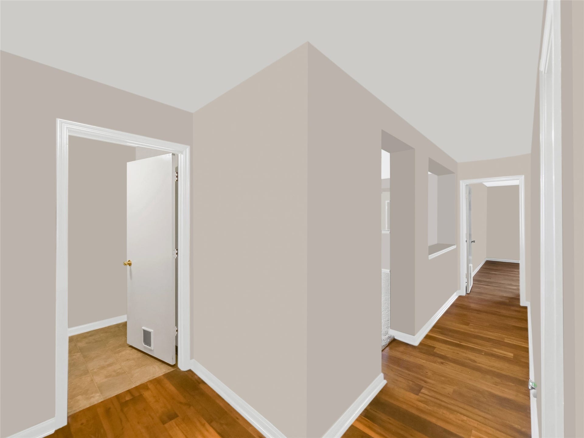 20911 Harvest Terrace Lane, Spring, TX 77379 Interior hallway and doorways leading to adjacent rooms.