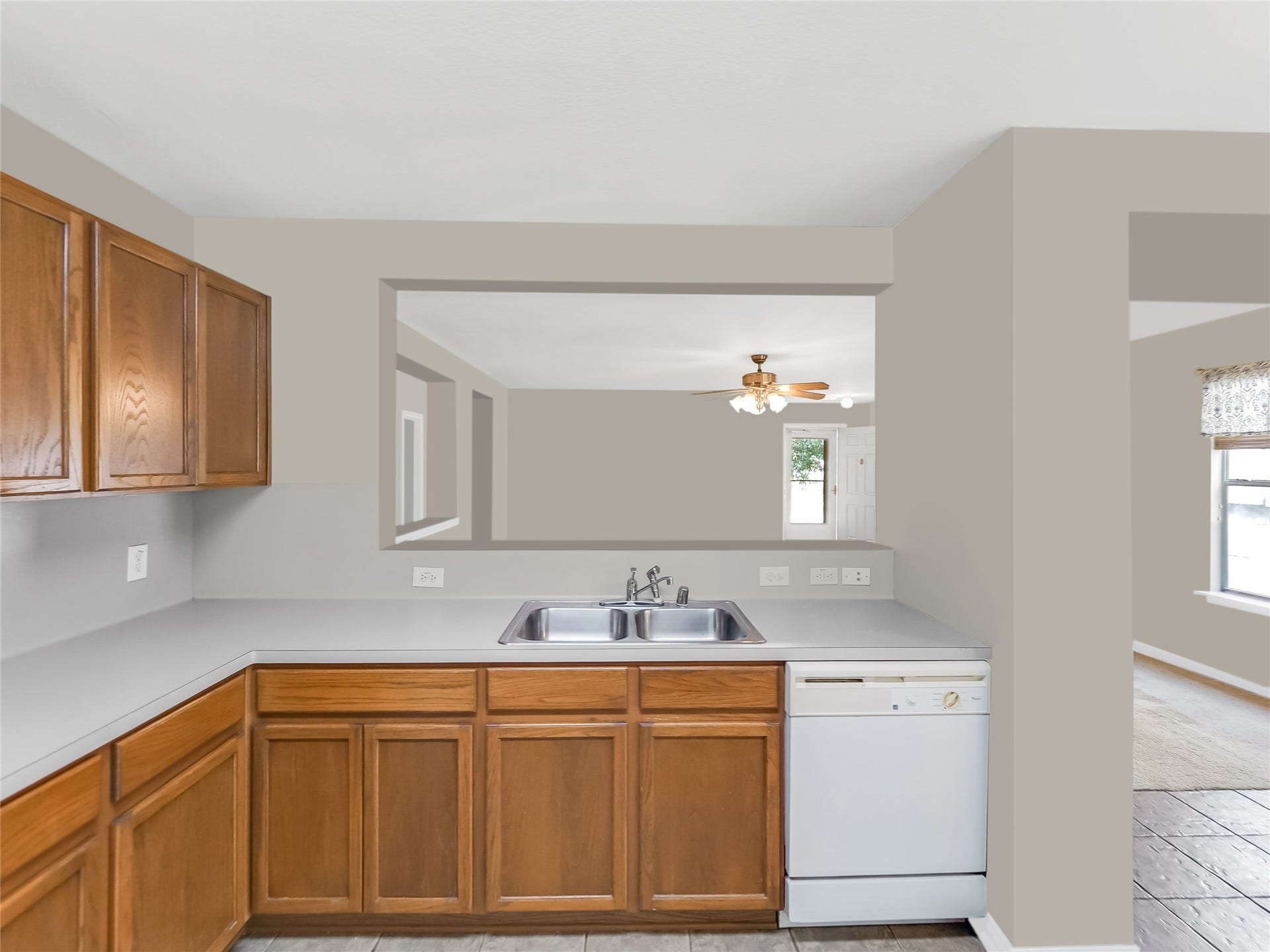 20911 Harvest Terrace Lane, Spring, TX 77379 Kitchen and a breakfast bar overlooking the living area.