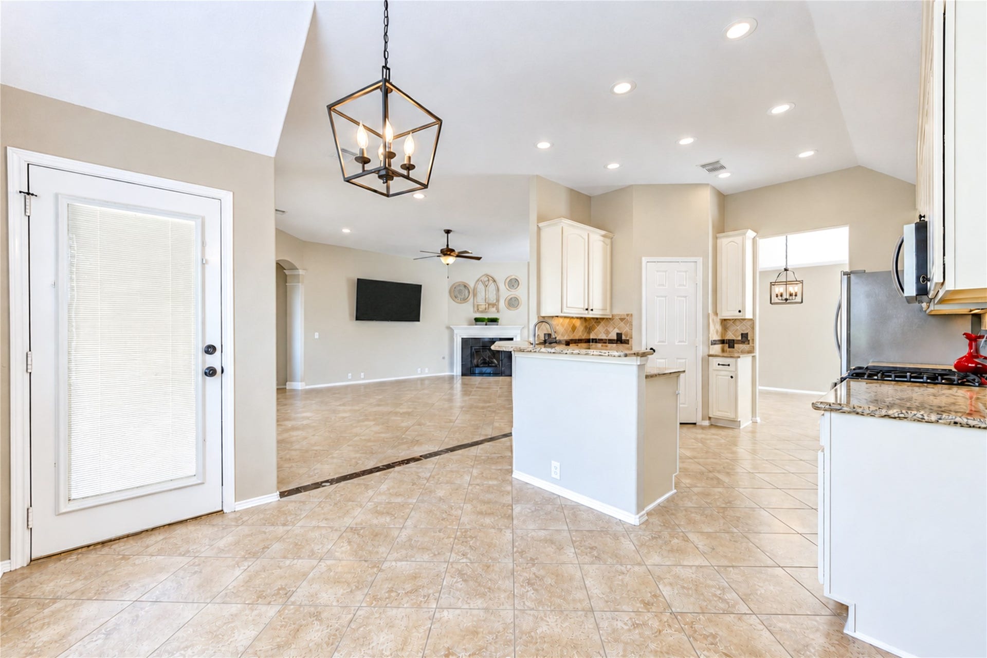 Connected to the kitchen and living room, the breakfast area provides access to the back yard.