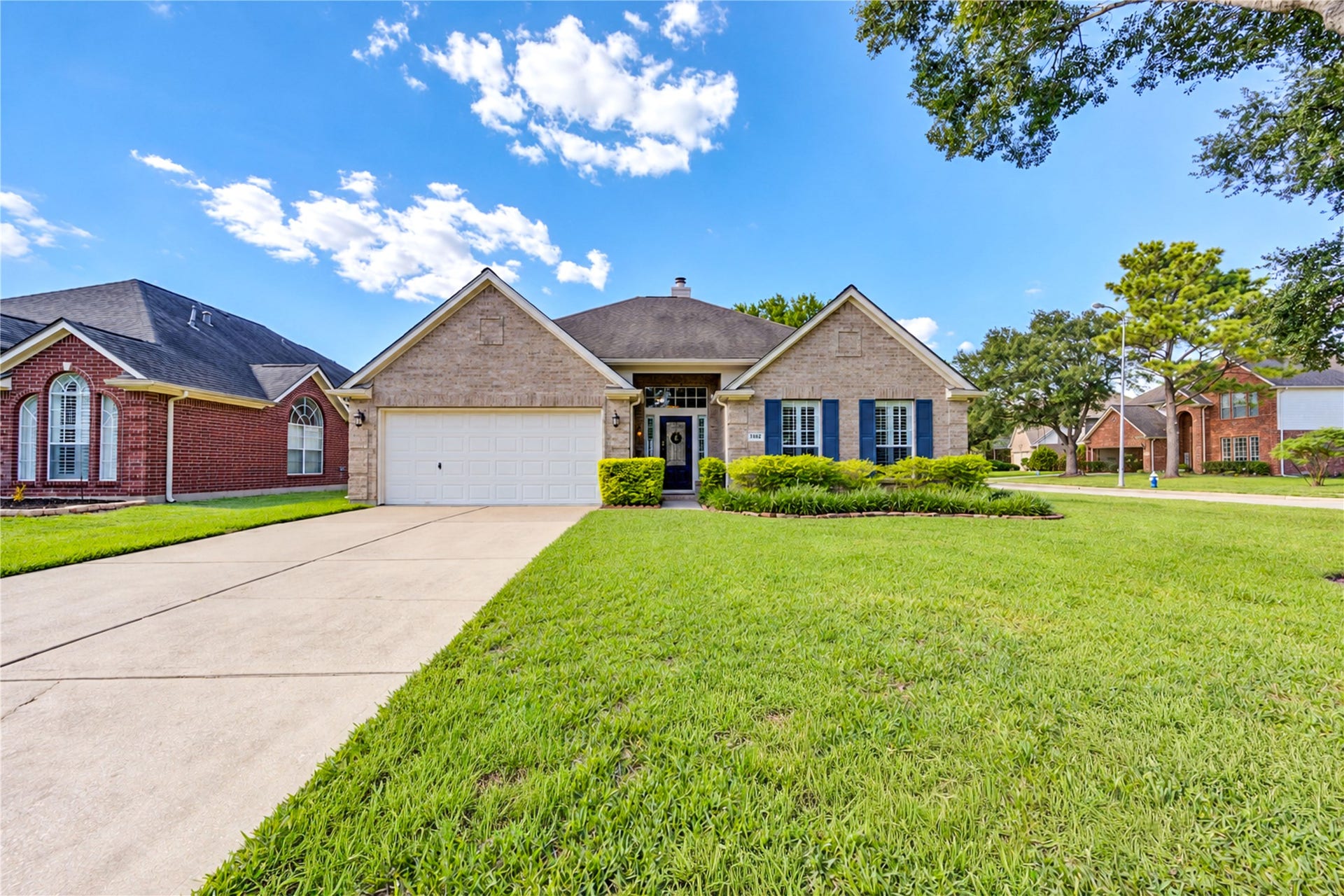 Beautiful home on a corner lot in Cinco Ranch Equestrian Village.