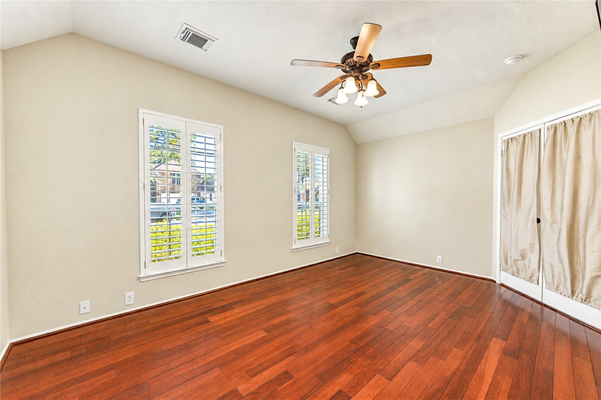 Home office has glass doors.