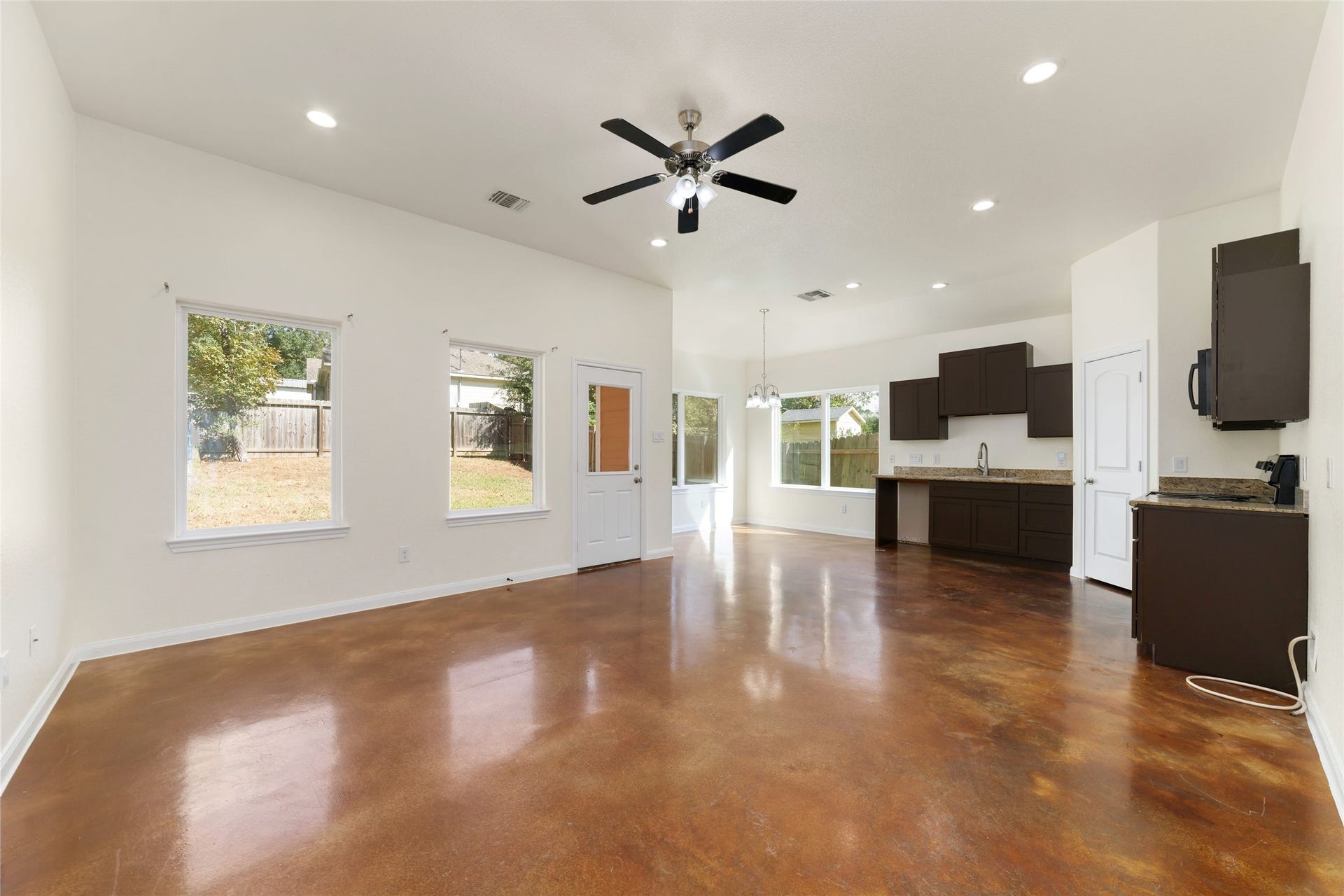 15704 Sycamore Drive, Montgomery, TX 77356 Open kitchen/living combo + Dining area view