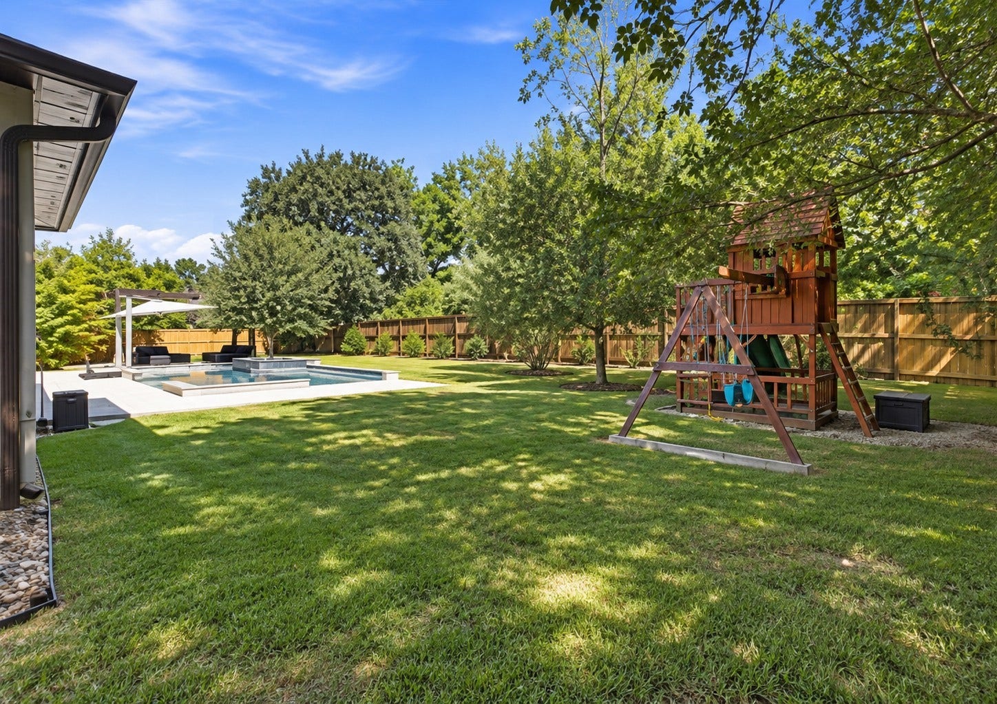 35 Gracenote Pl, The Woodlands, TX 77375 An impressive outdoor oasis offers plenty of space to entertain, unwind, and enjoy everything this backyard has to offer.