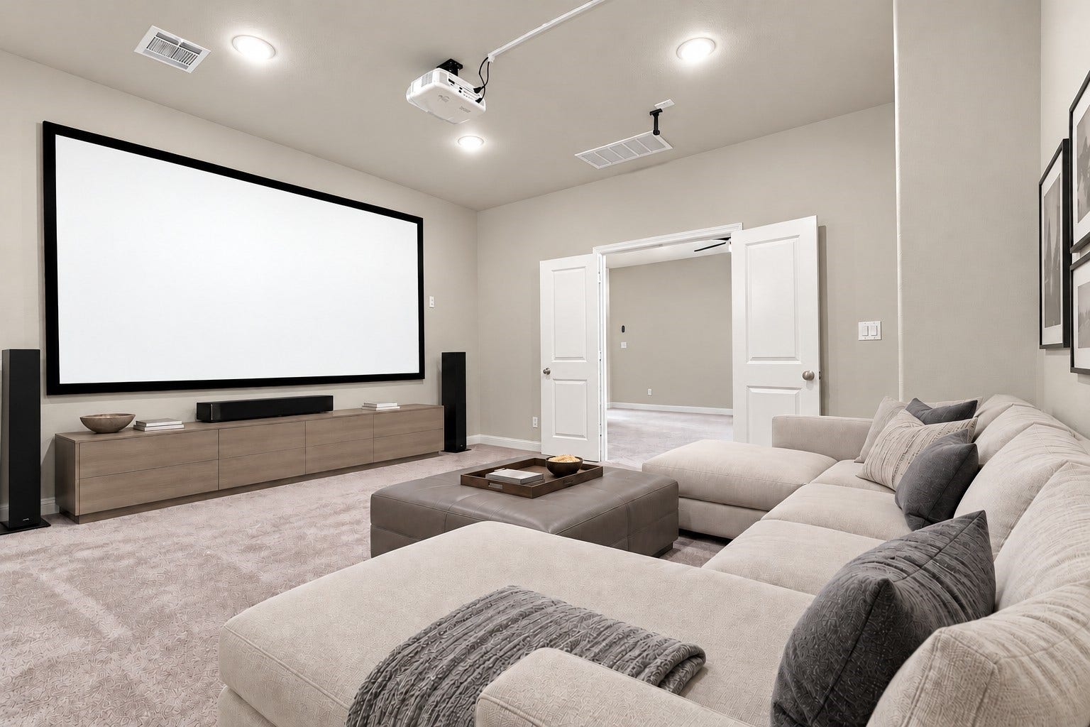 35 Gracenote Pl, The Woodlands, TX 77375 Dedicated media room featuring a projector and screen, creating the perfect space for movie nights, game days, and at-home entertainment. VIRTUALLY STAGED