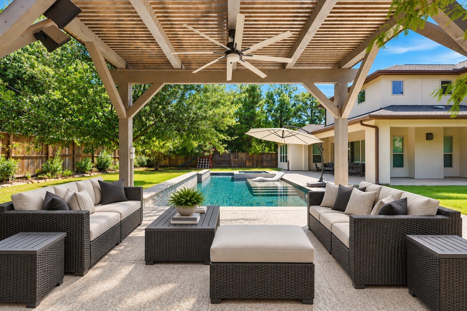 35 Gracenote Pl, The Woodlands, TX 77375 Inviting outdoor living space with covered pergola, sparkling pool, and beautifully landscaped backyard.