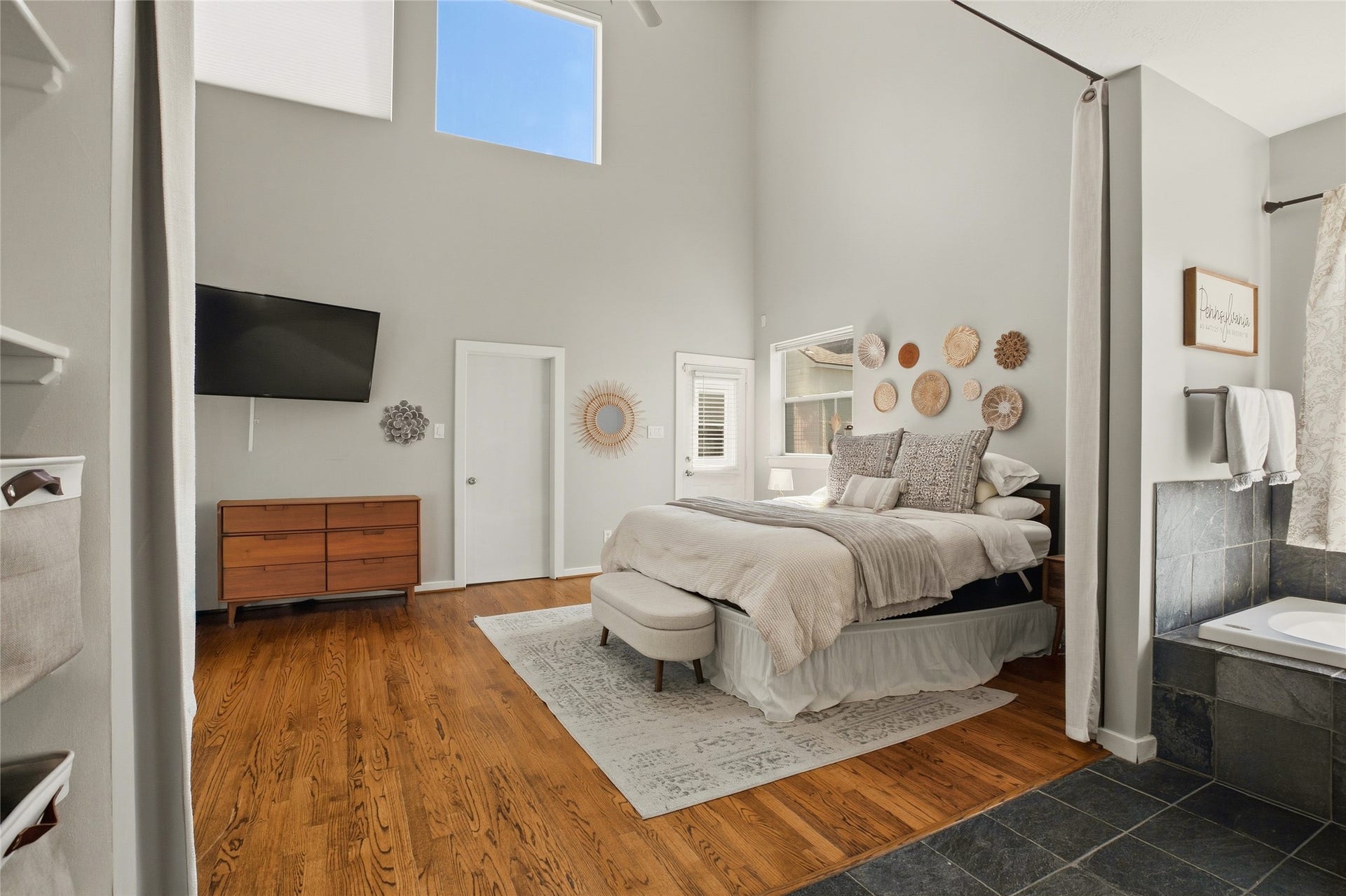 1803 Oneil Street, #C, Houston, TX 77019 Spacious primary retreat with high windows and a walk-through bath.