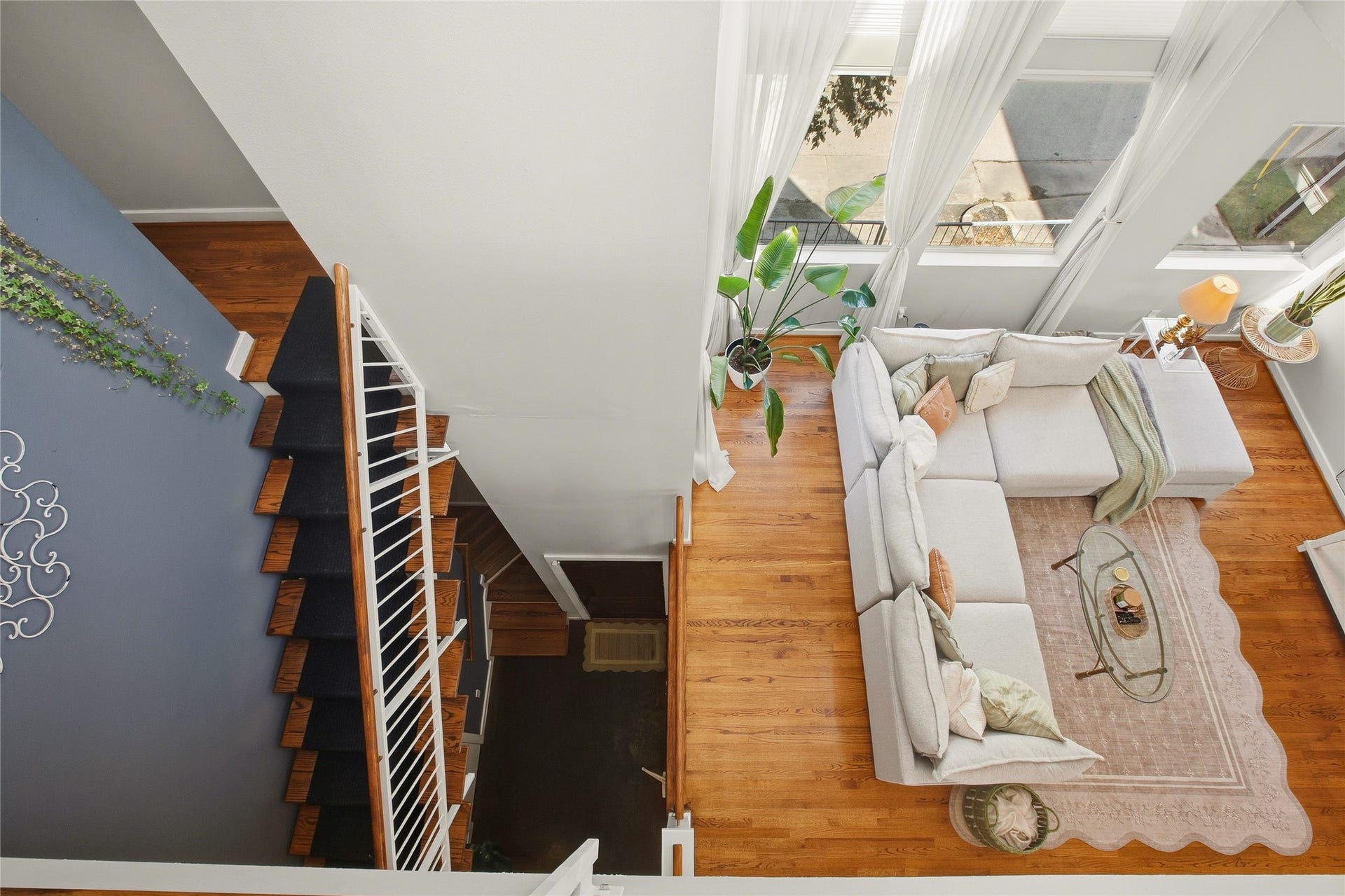 1803 Oneil Street, #C, Houston, TX 77019 Bird's-eye view of the living room and the home's striking vertical design.
