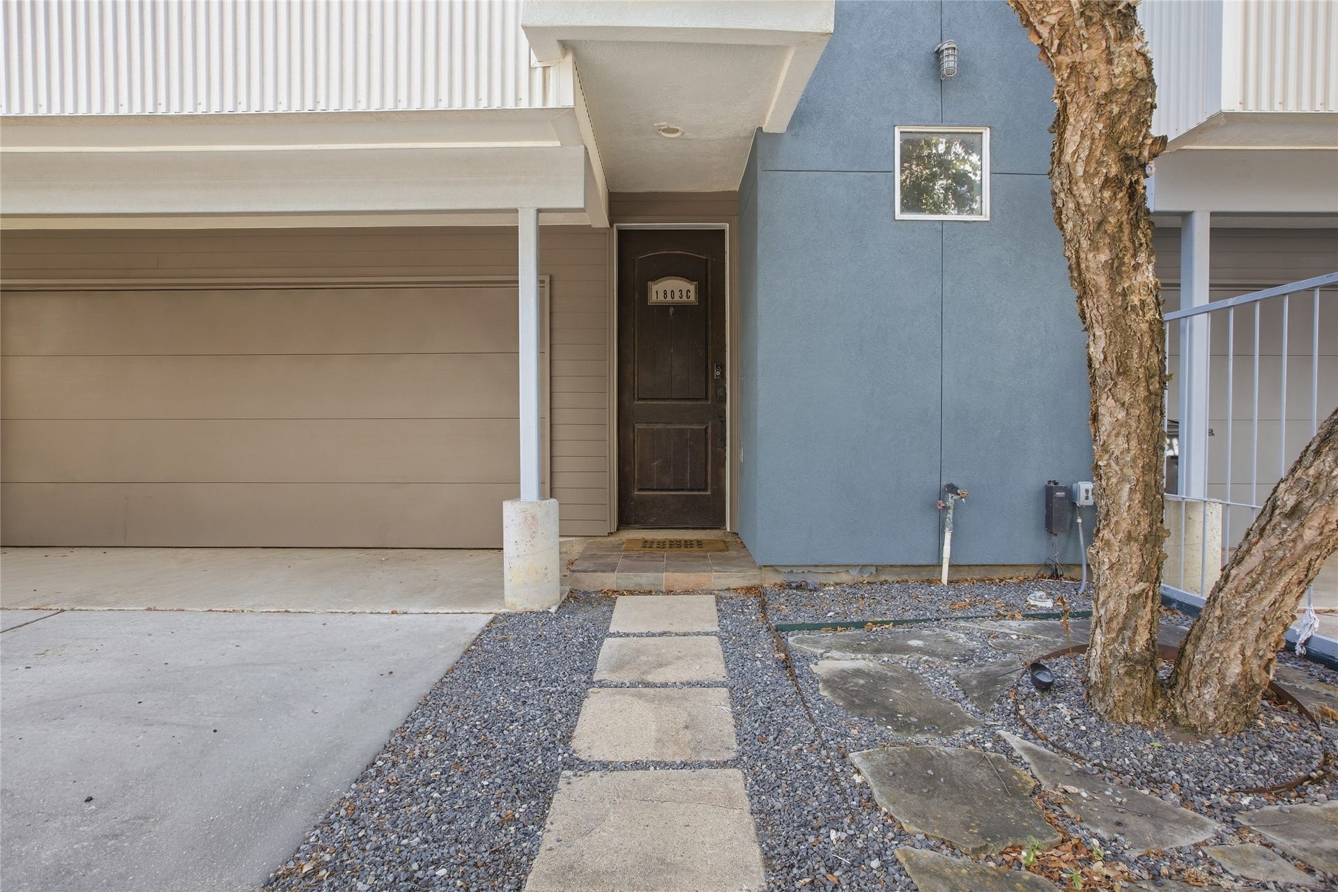 1803 Oneil Street, #C, Houston, TX 77019 Landscaped stone walkway leads to a welcoming front entry.