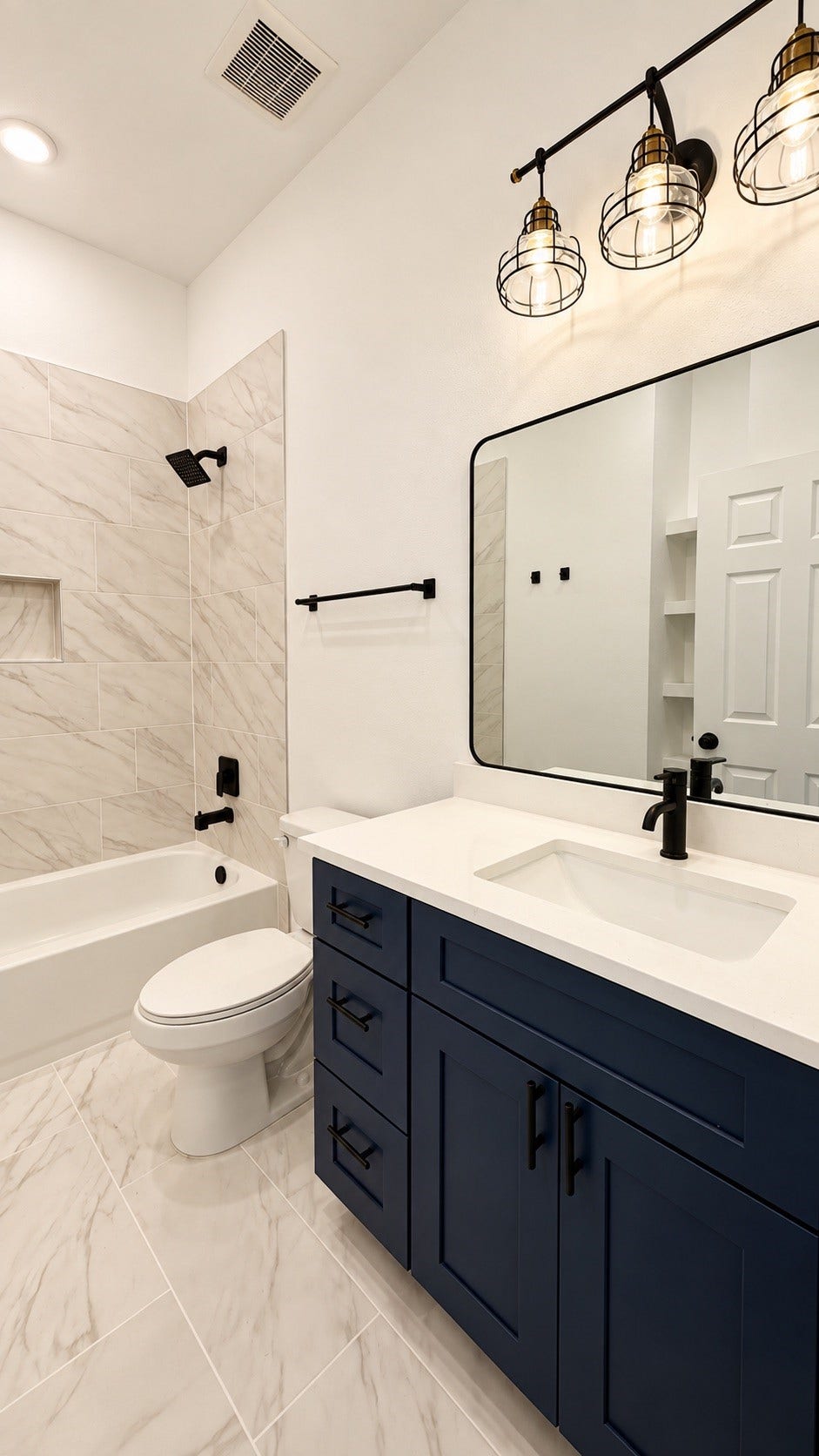 8715 Victoria Forest Drive, Houston, TX 77088 Modern primary bathroom featuring a spacious bathtub, stylish finishes, and a contemporary design.