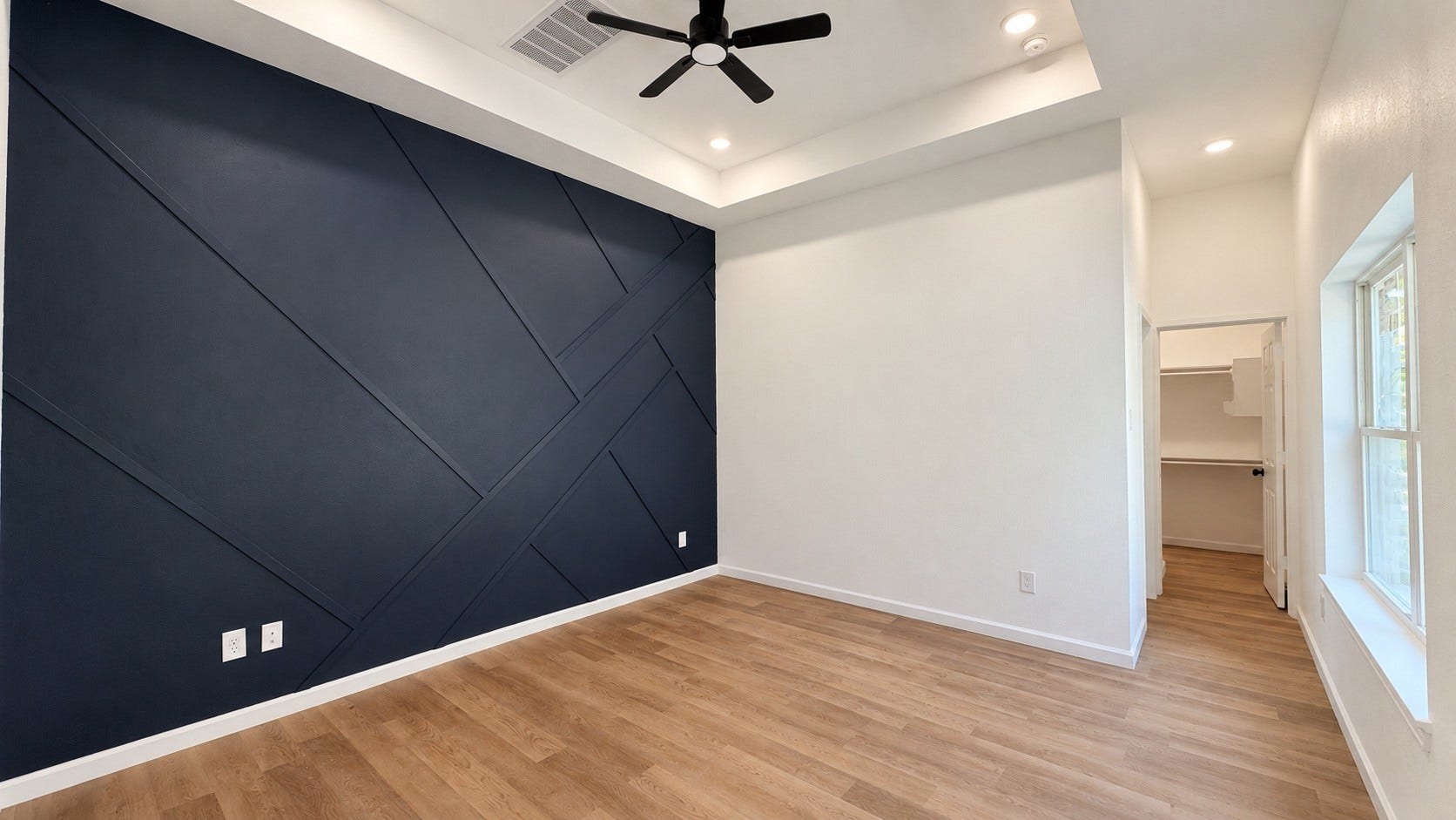 8715 Victoria Forest Drive, Houston, TX 77088 Spacious Primary Bedroom with Custom Accent wall