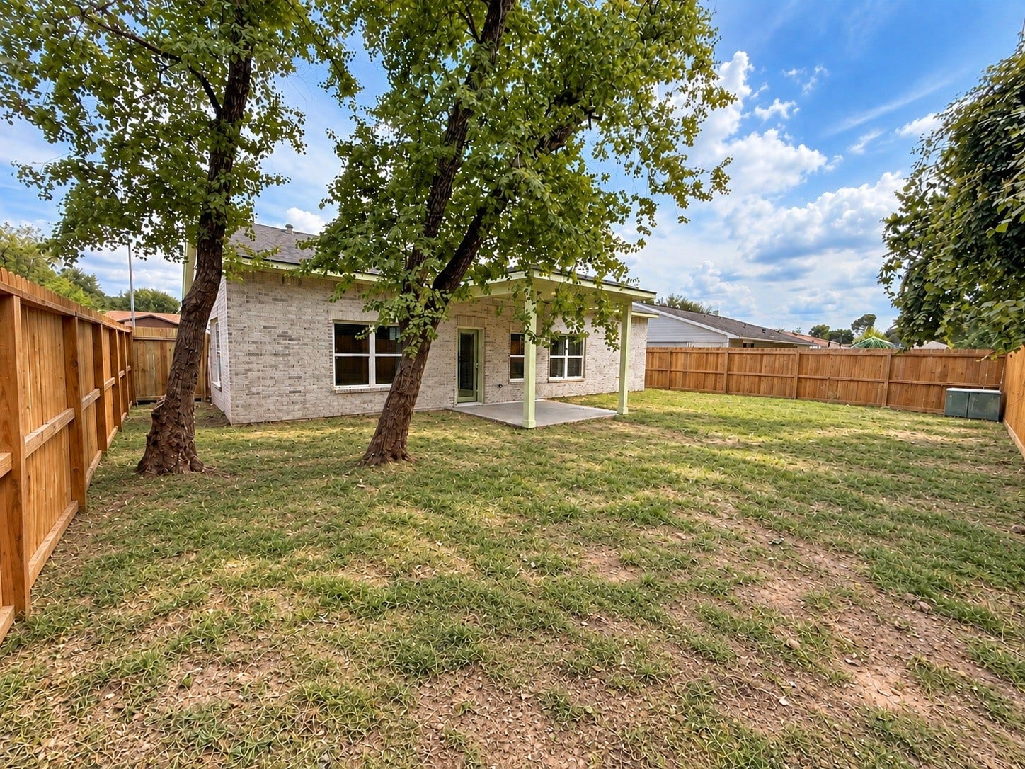 8715 Victoria Forest Drive, Houston, TX 77088 The backyard is currently undergoing landscaping and sodding.