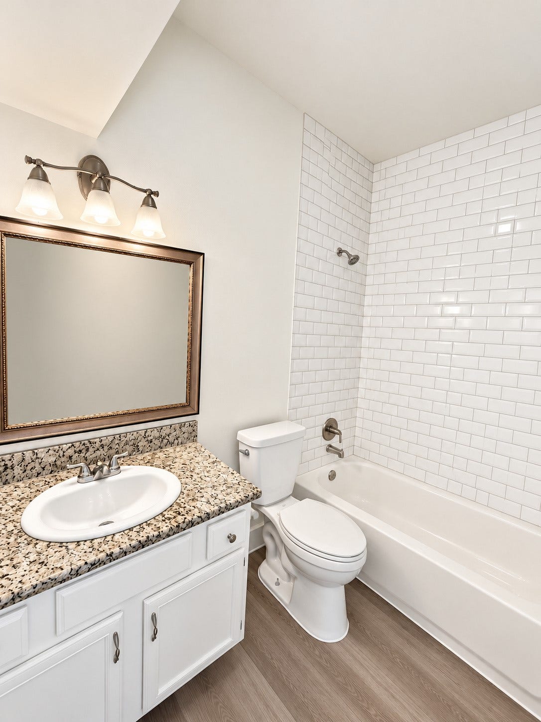 2025 Augusta Drive, #207, Houston, TX 77057 Bathroom with updated subway tile and granite counter