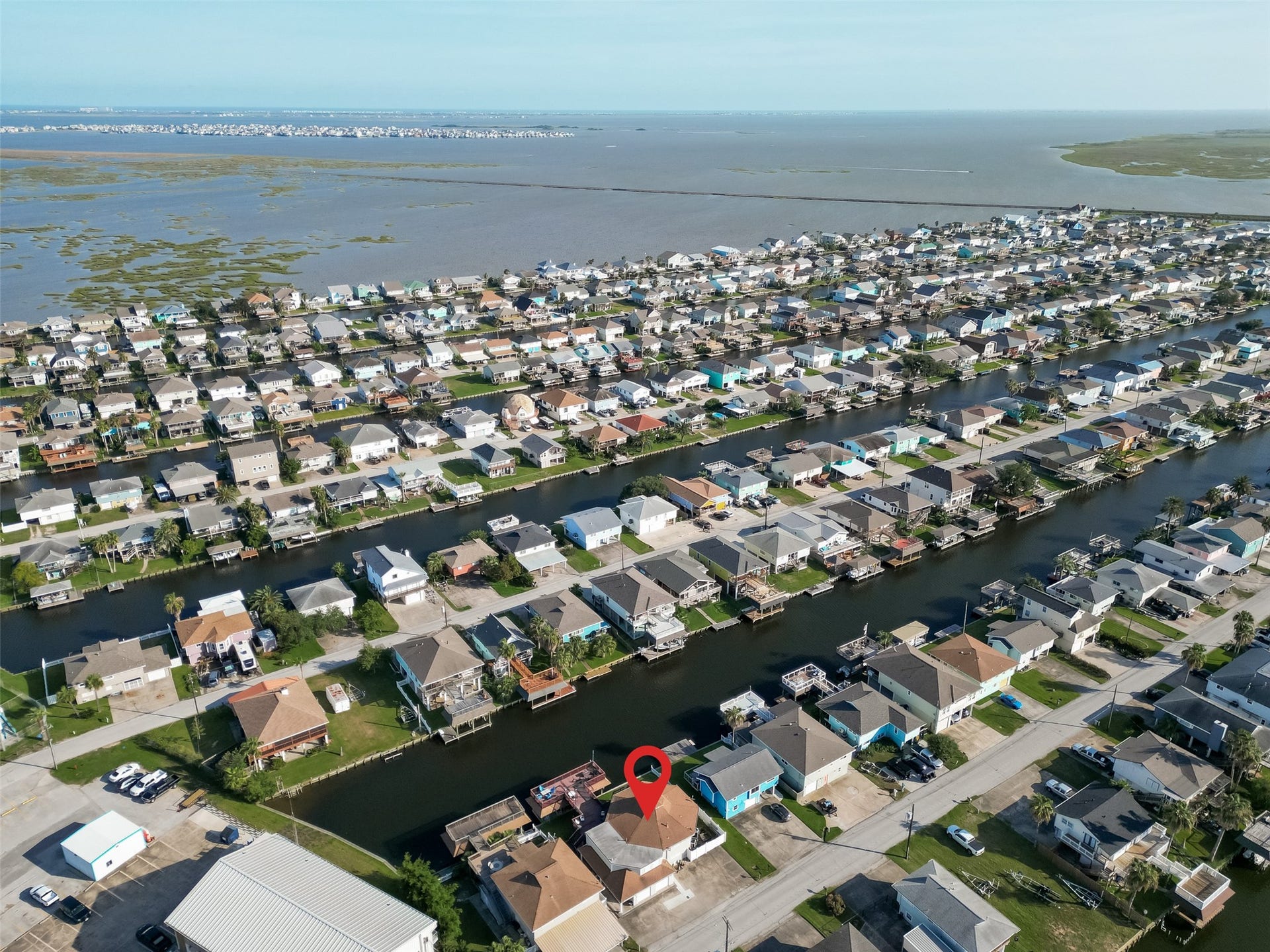 Unmatched geographic appealcapturing the expansive coastal landscape, waterways, and proximity to open bay waters.
