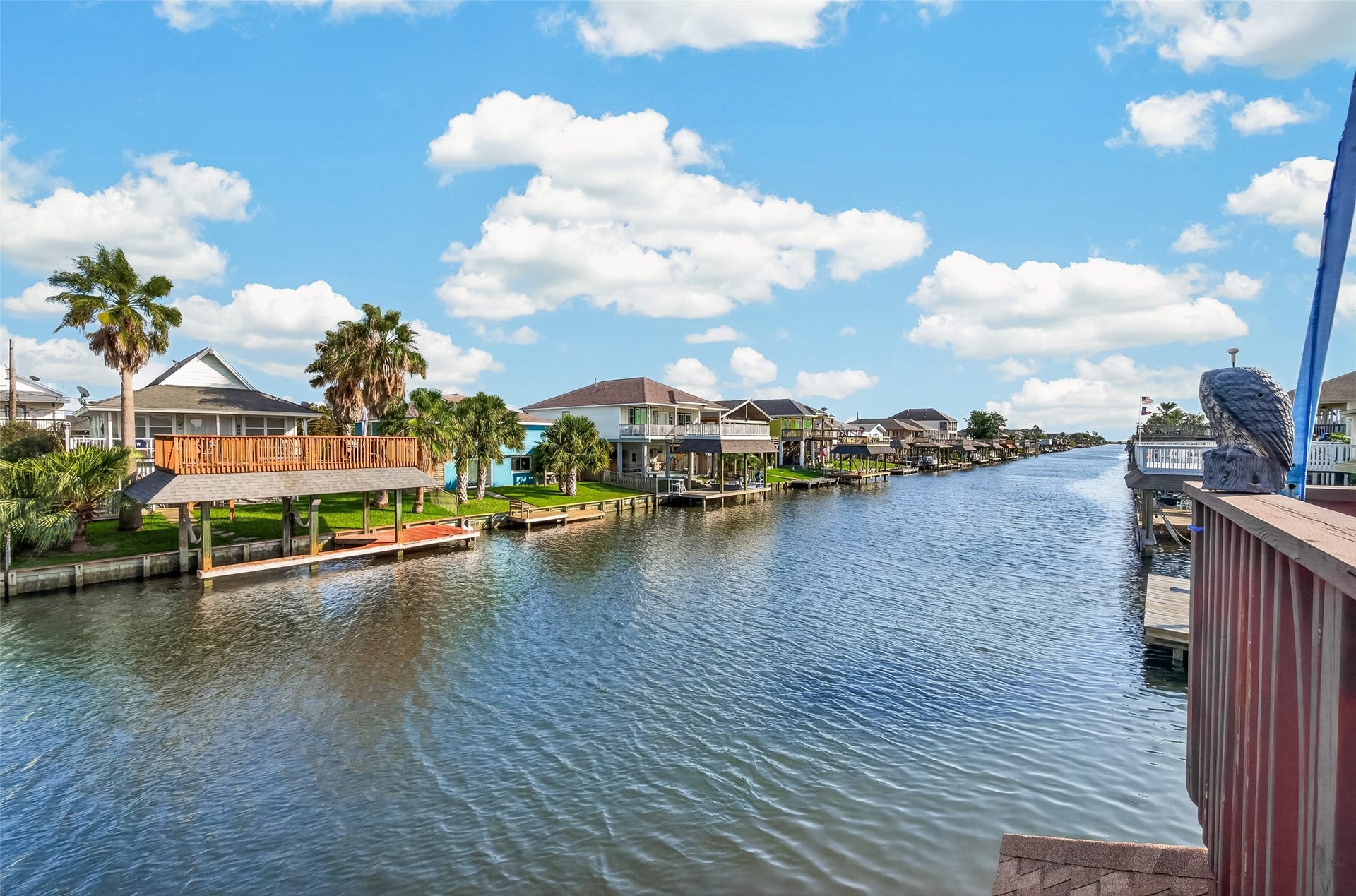 Calm coastal waters and endless blue skiesyour daily backdrop in this prime East-facing Bayou Vista sanctuary.