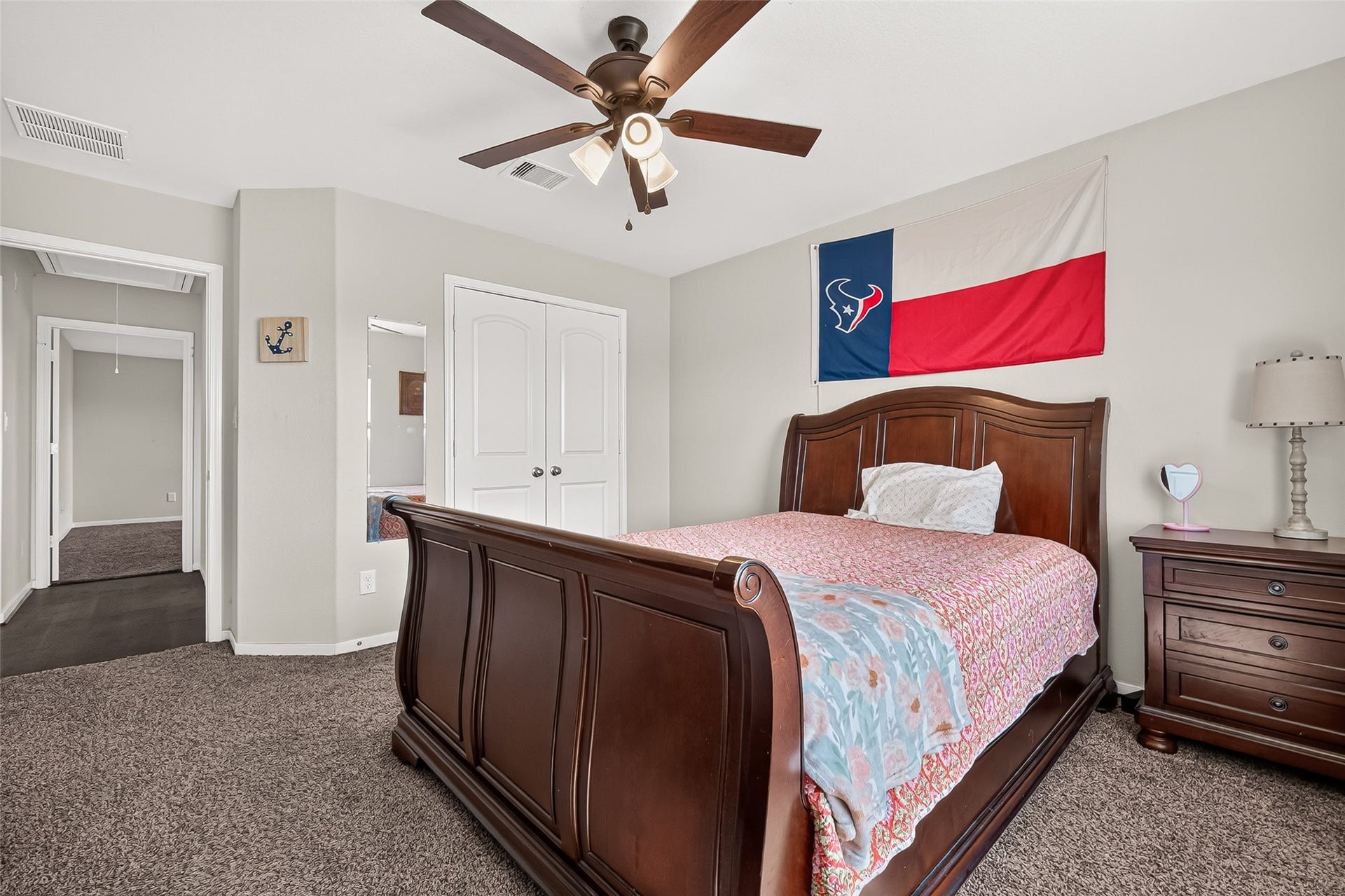 6111 Wayne Way, Rosenberg, TX 77471 Another view of an upstairs bedroom with convenient access to its adjoining spaces.