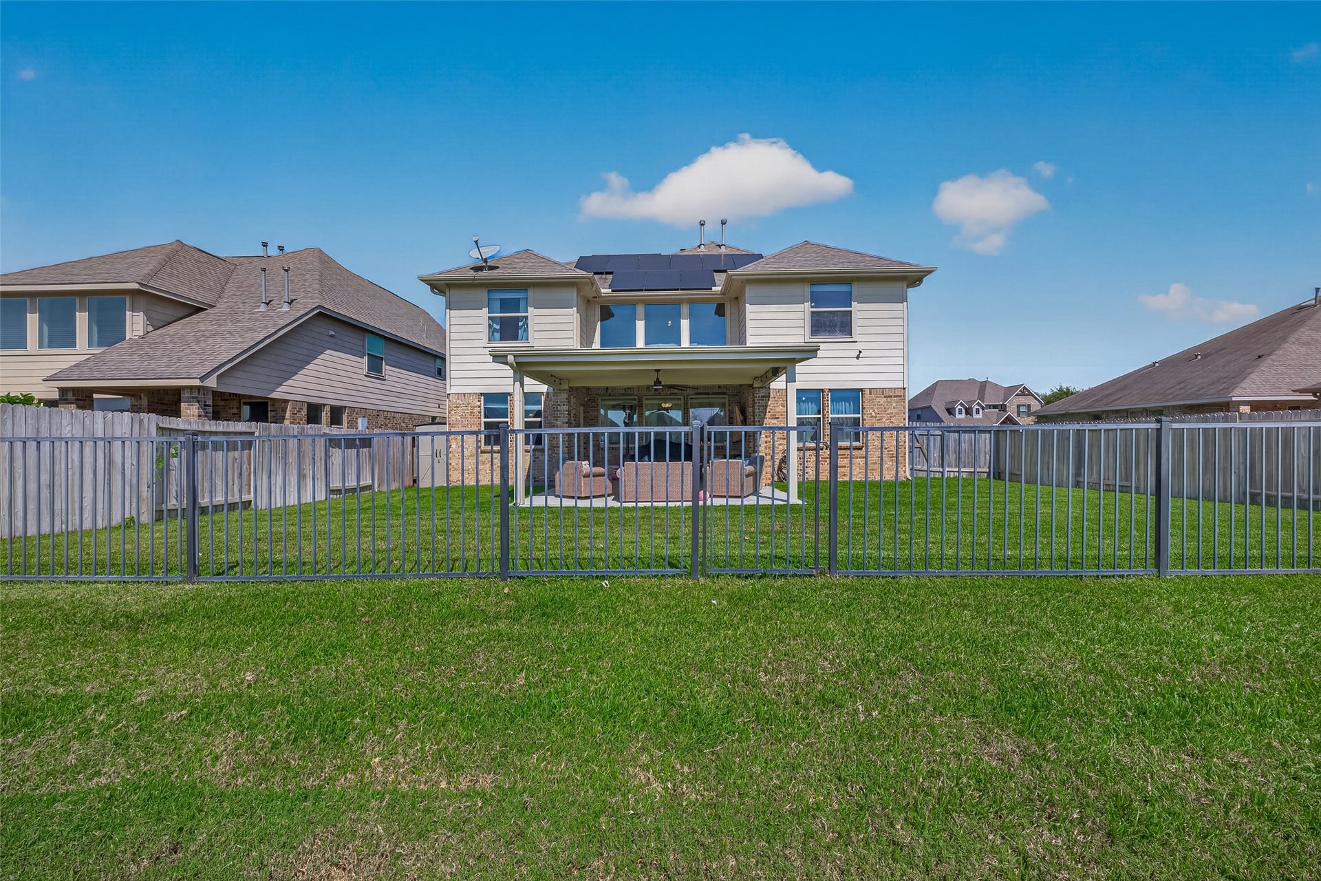 6111 Wayne Way, Rosenberg, TX 77471 A view from the park behind the home highlights its backyard setting in Kingdom Heights, Rosenberg.