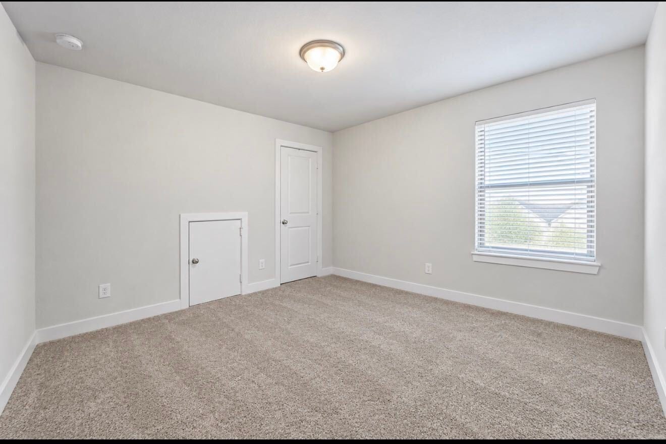 9231 Dearborn Knoll Drive, Cypress, TX 77433 Comfortable and versatile secondary bedroom.