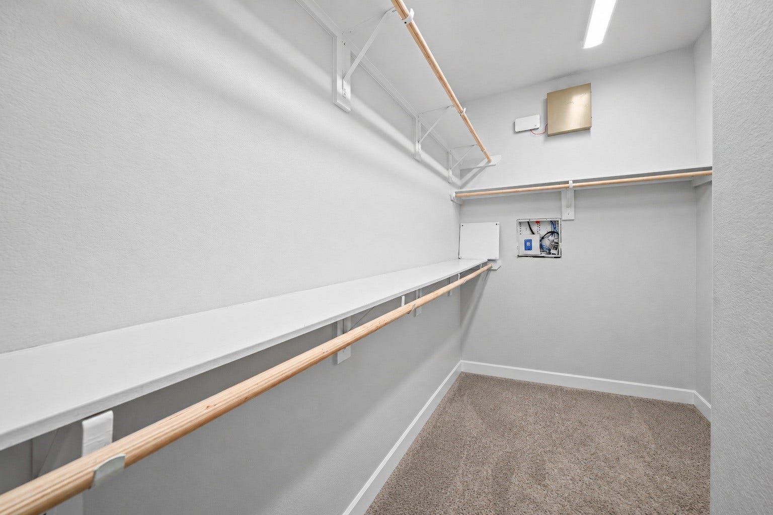 9231 Dearborn Knoll Drive, Cypress, TX 77433 A walk-in closet with space to spare, making it easy to keep clothes, shoes, and extras neatly put away.