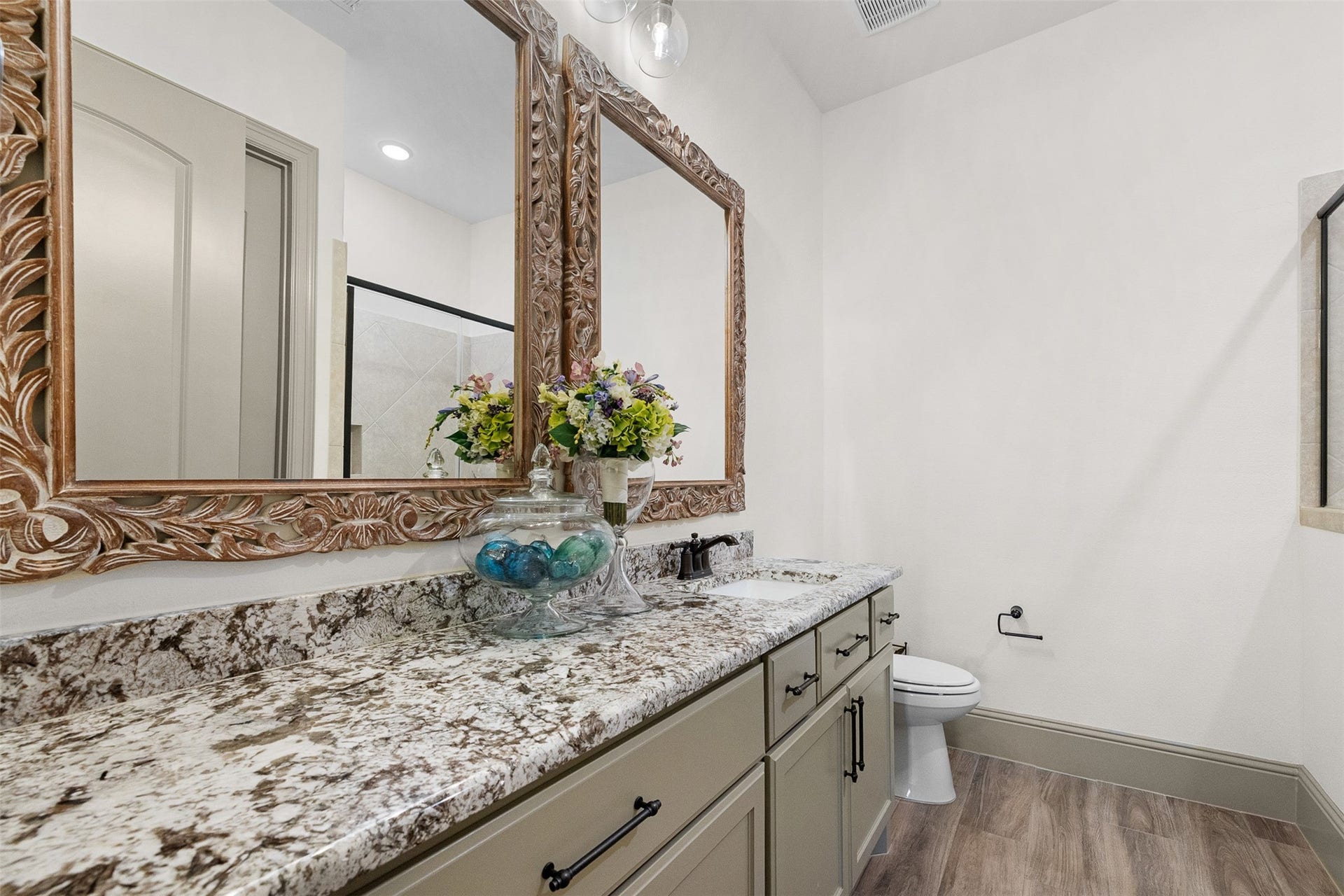 8603 Woods Hollow Trail, Fulshear, TX 77406 Guestroom can be considered a second primary with its ensuite bathroom with a shower only and generous storage closet.