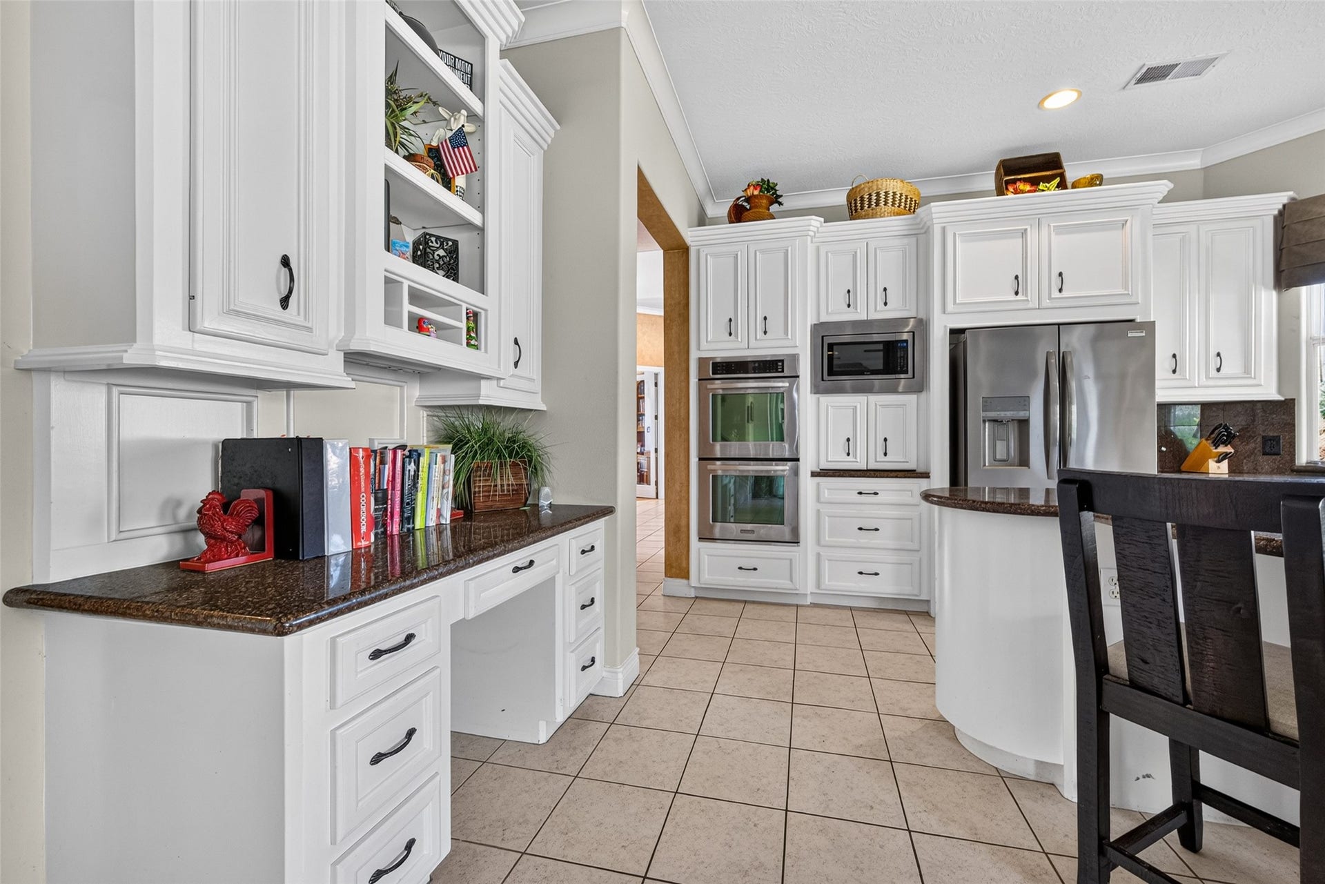 A desk area allows for additional storage of a great space for studying