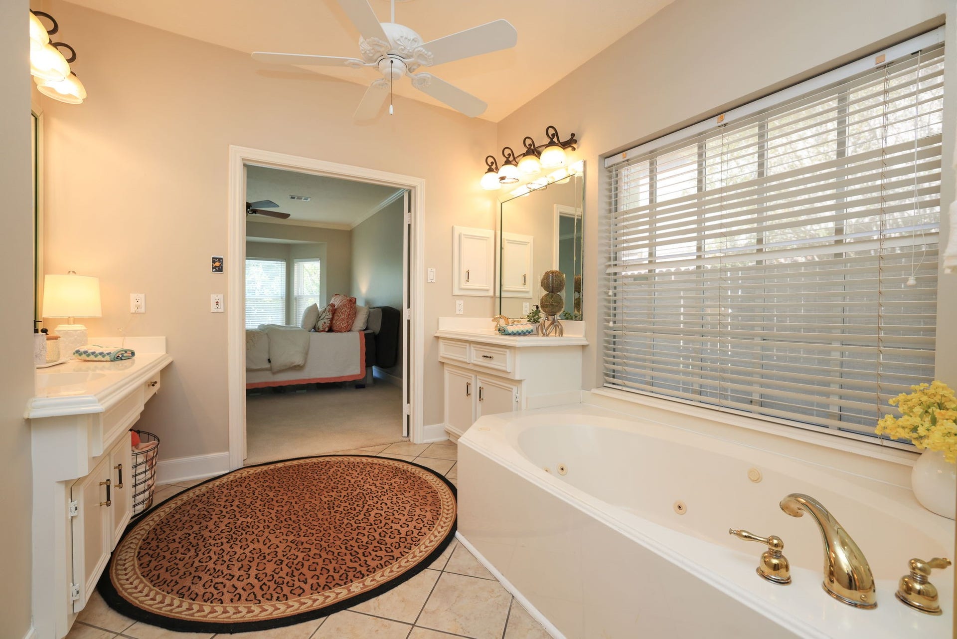16107 Abberton Hill Drive, Spring, TX 77379 Relaxing ensuite bath with abundant natural light and easy flow back into the primary suite.