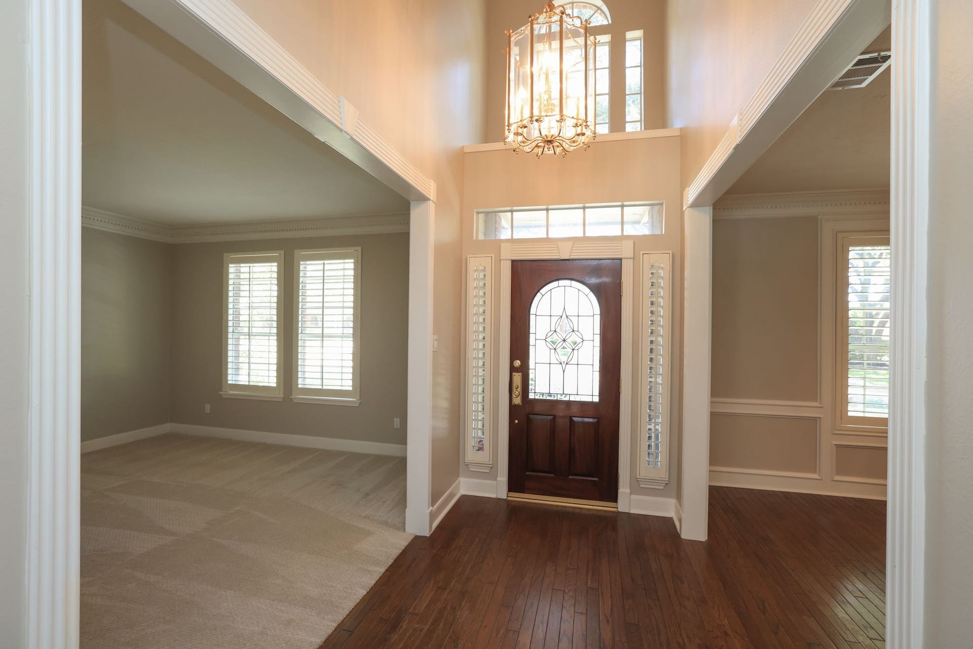 16107 Abberton Hill Drive, Spring, TX 77379 ALL NEW INTERIOR PAINT NEW! Bright two-story foyer with gleaming hardwood floors, custom millwork, and natural light from transom windows.