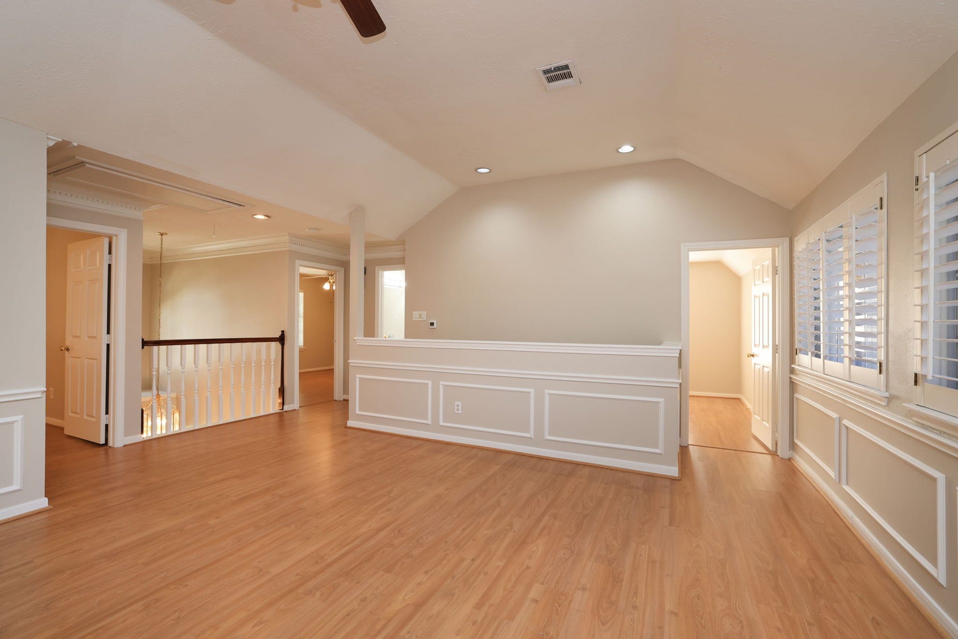 16107 Abberton Hill Drive, Spring, TX 77379 Beautifully detailed with chair rail molding and recessed lighting, this open game room overlooks the entryway below.