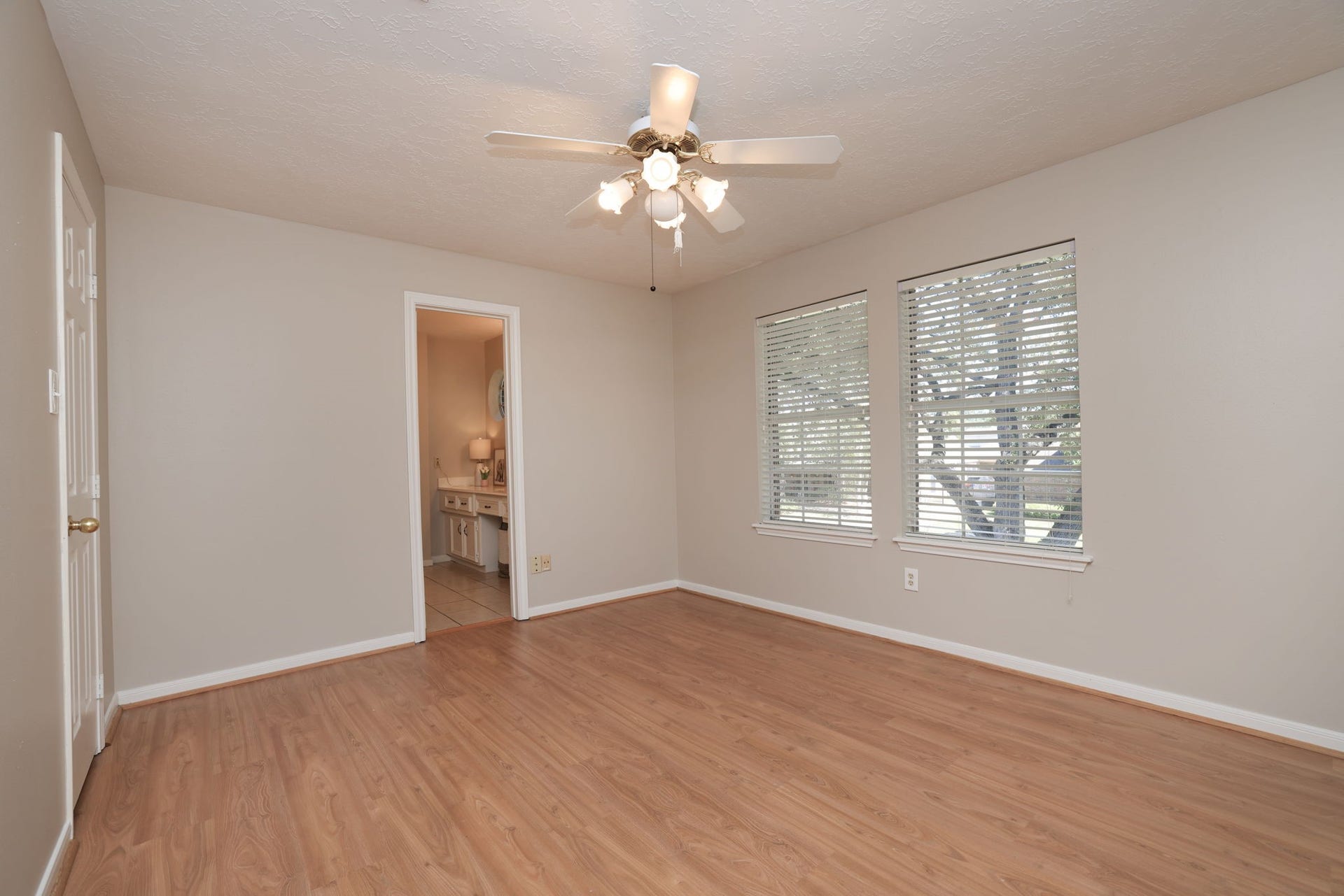16107 Abberton Hill Drive, Spring, TX 77379 Third upstairs bedroom with views of the backyard and convenient access to the full hall bath.