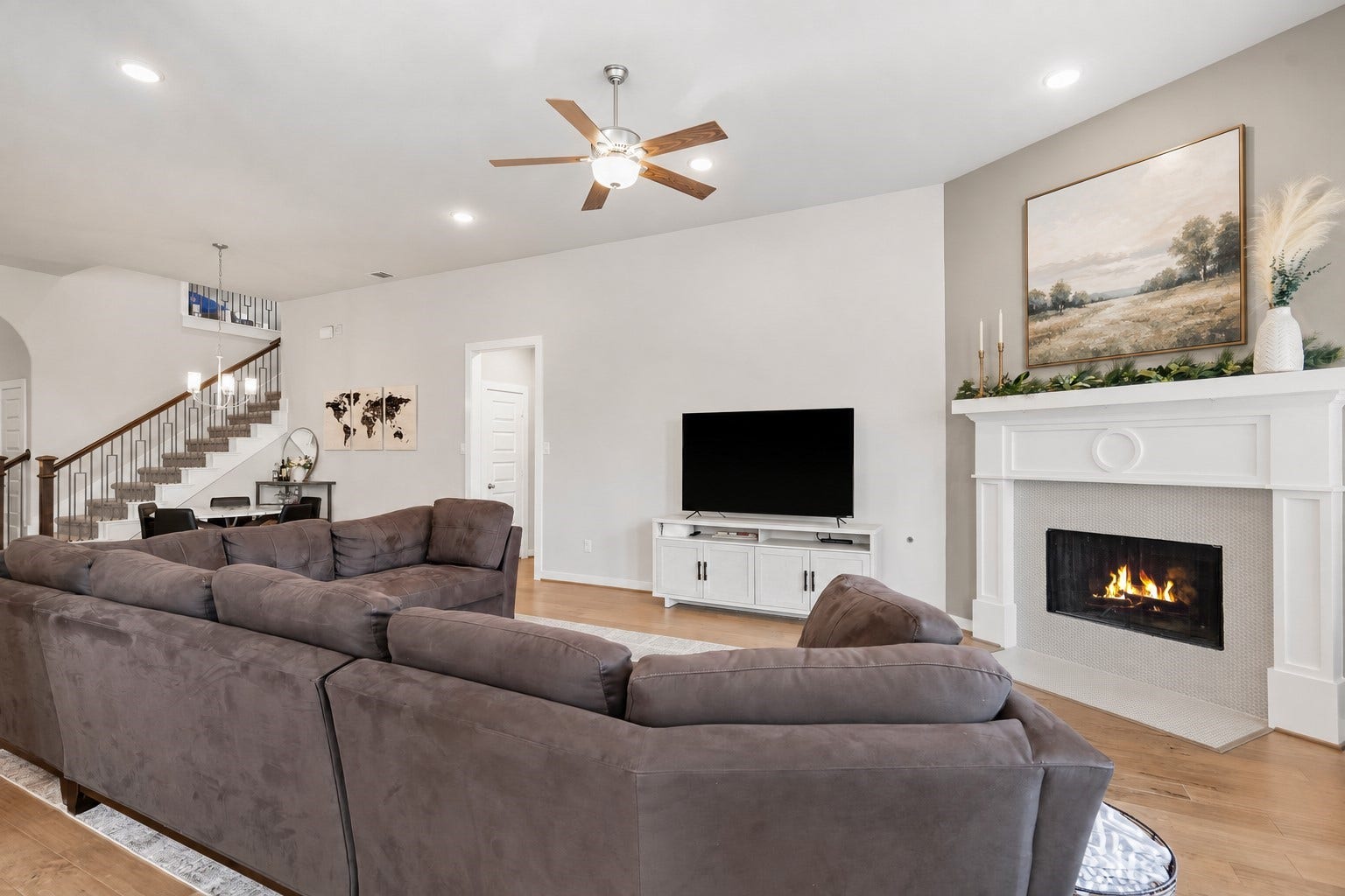 Imagine hosting the next holiday or social event in the perfect living space! This room can fit any size tv making it great for the next big game or movie night.