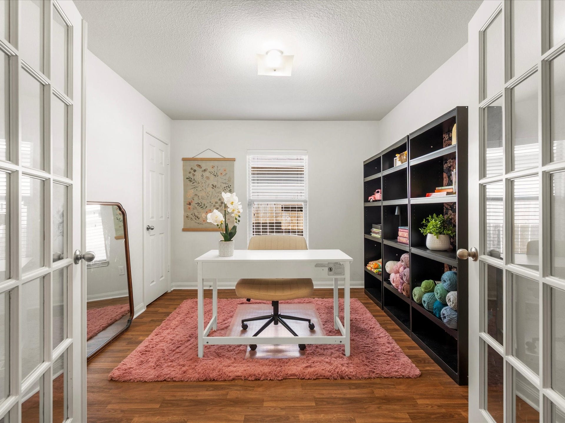 305 Pine Mist Lane, Conroe, TX 77304 A private study with French doors offers flexibility for working from home, hobbies, or creative projects. Could also be a 4th bedroom.